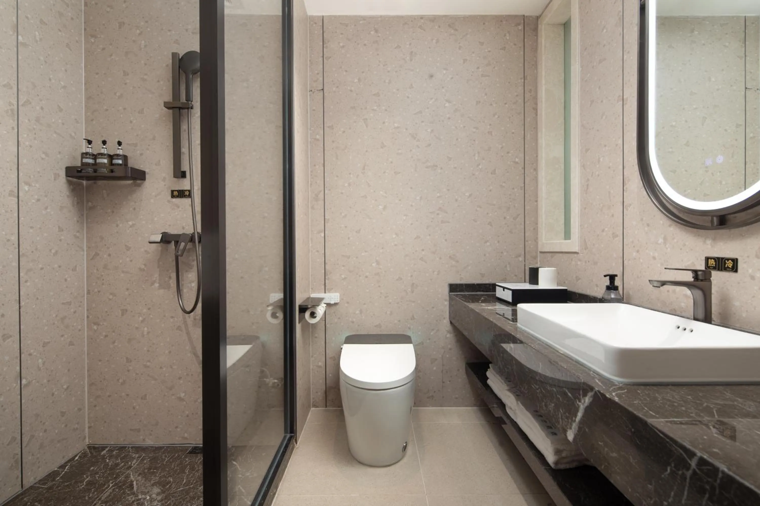 Toilet in Ramada by Wyndham Wuhan Wangjiawan