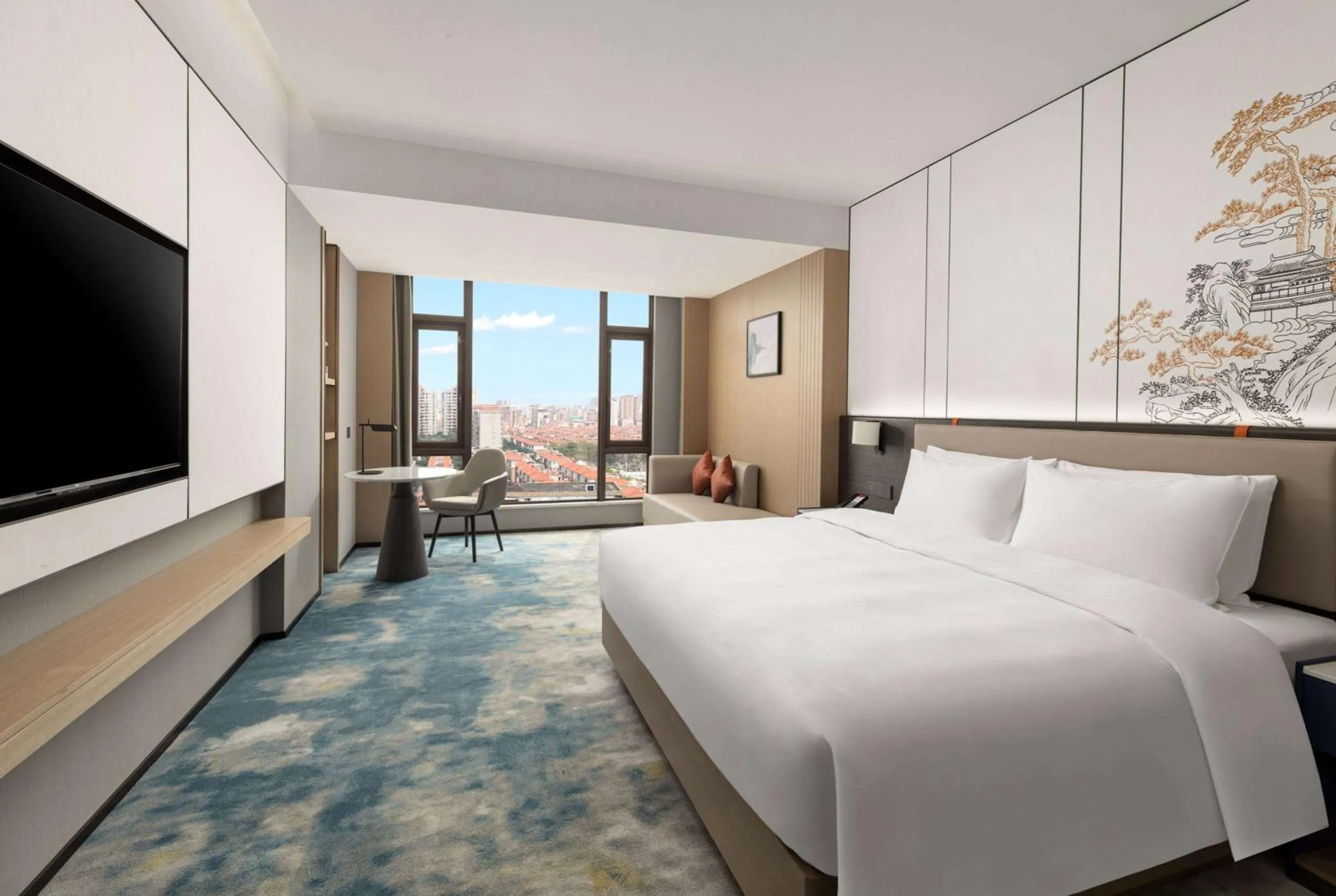 Photo of the whole room in Ramada Encore by Wyndham Dongguan Chang an