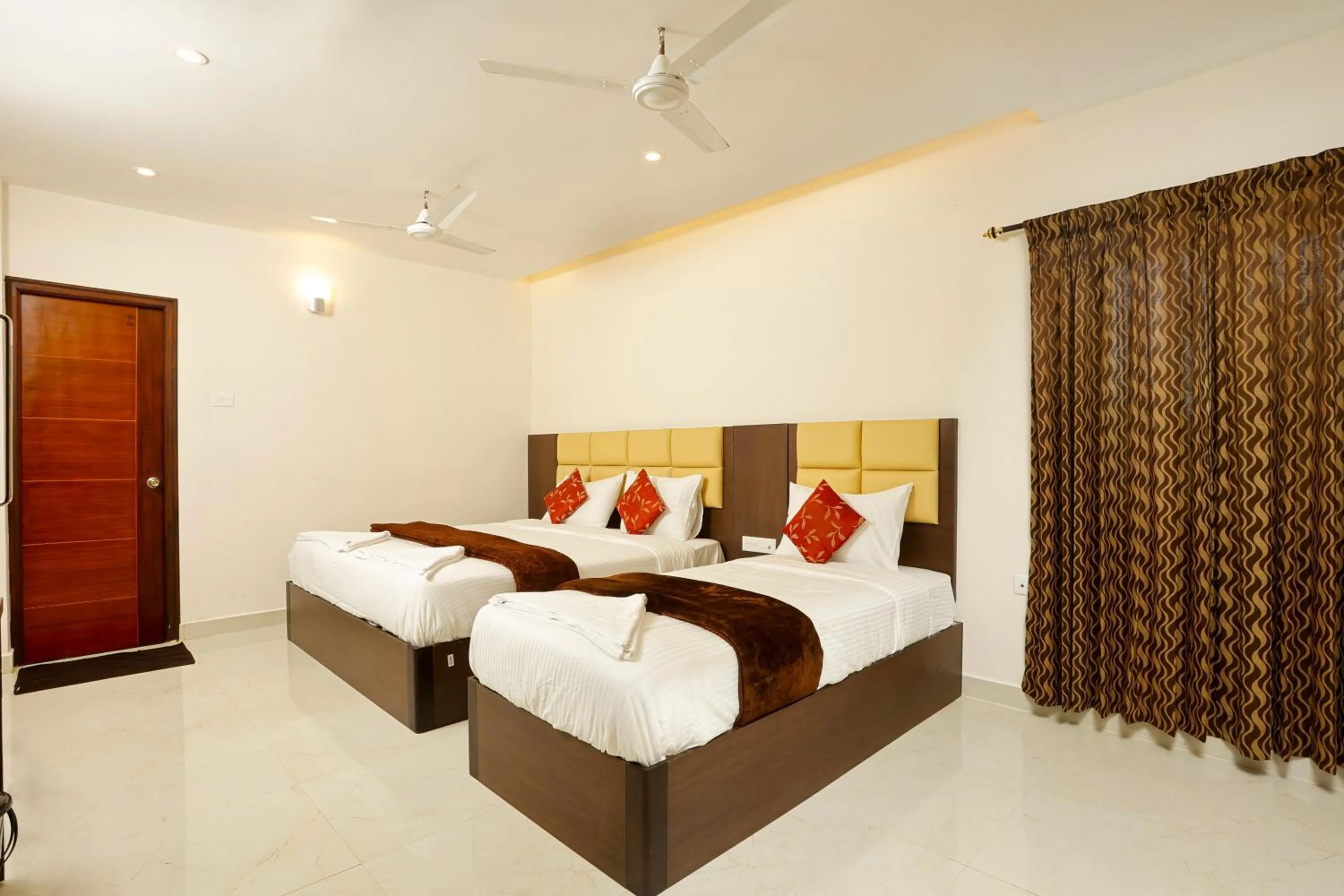 Bed in Rameswaram Harish Palace