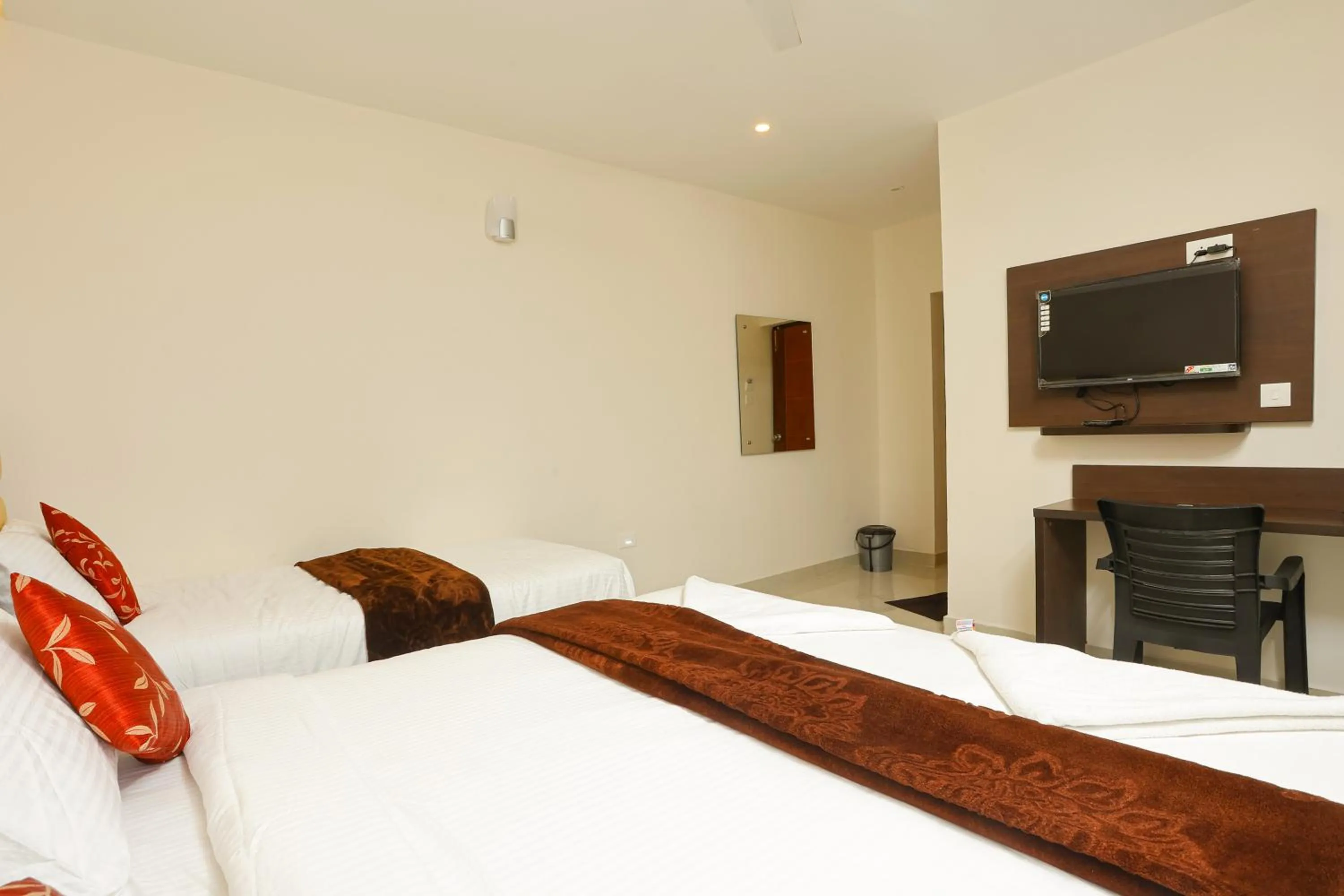 Bed in Rameswaram Harish Palace