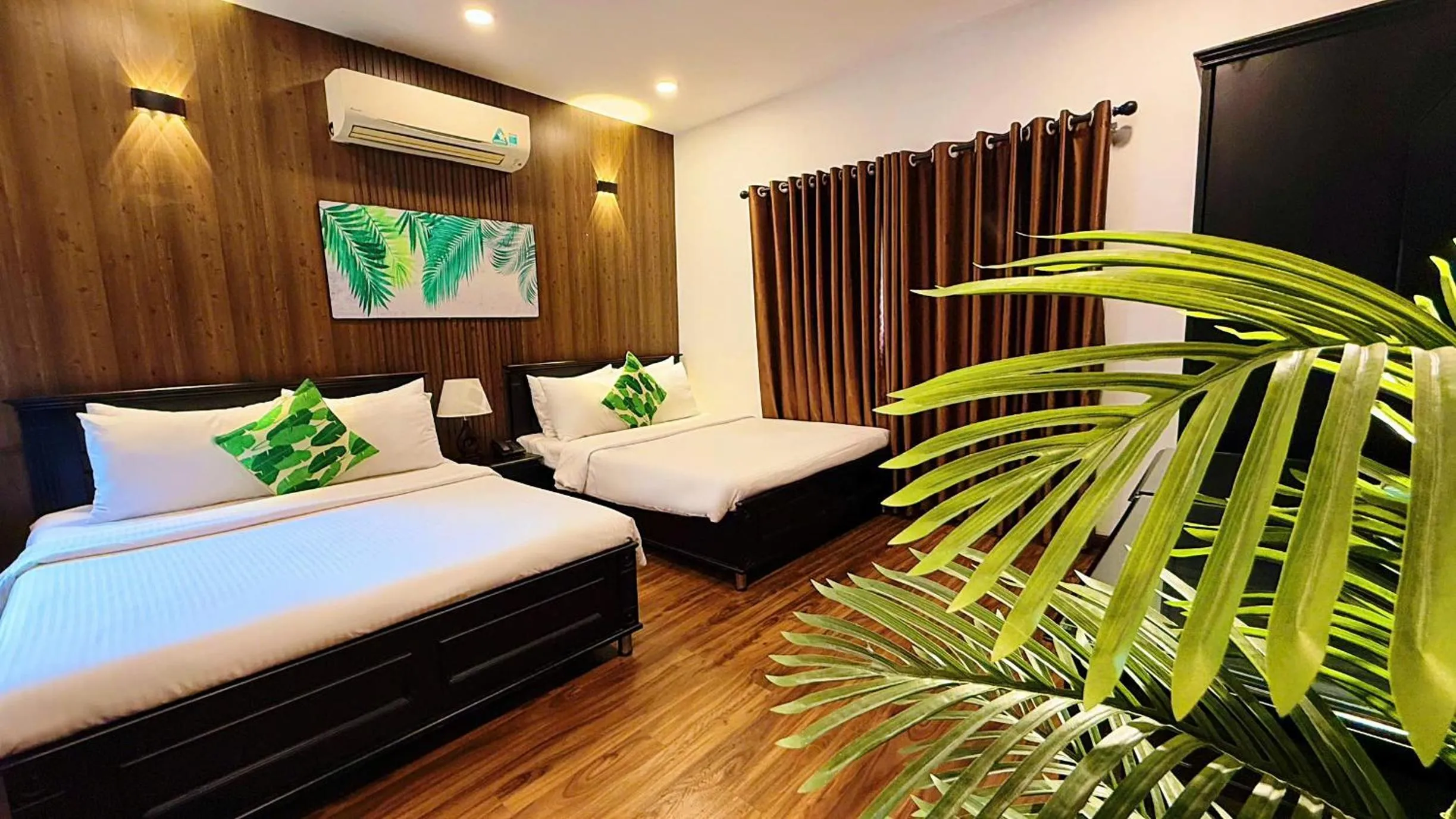 Bed in Rosa May Hotel