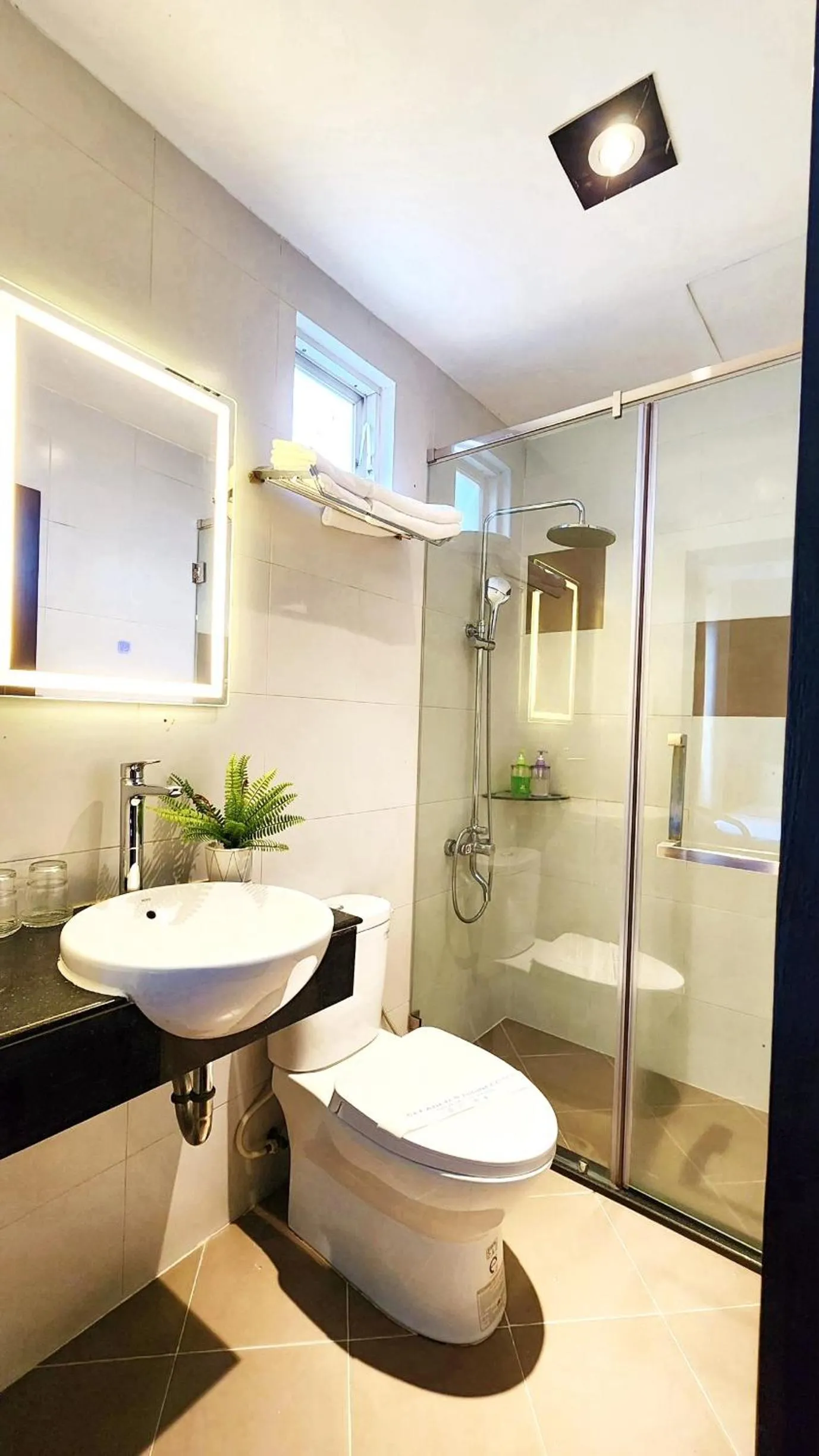 Shower in Rosa May Hotel