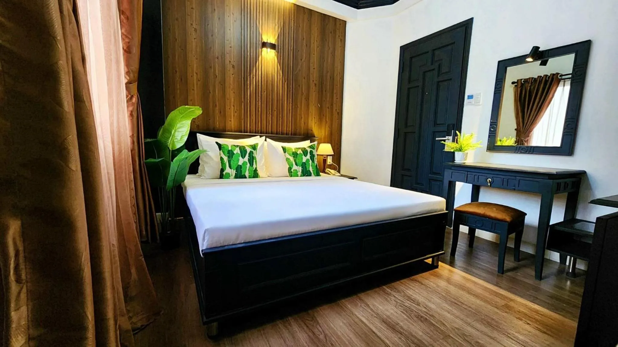 Bed in Rosa May Hotel