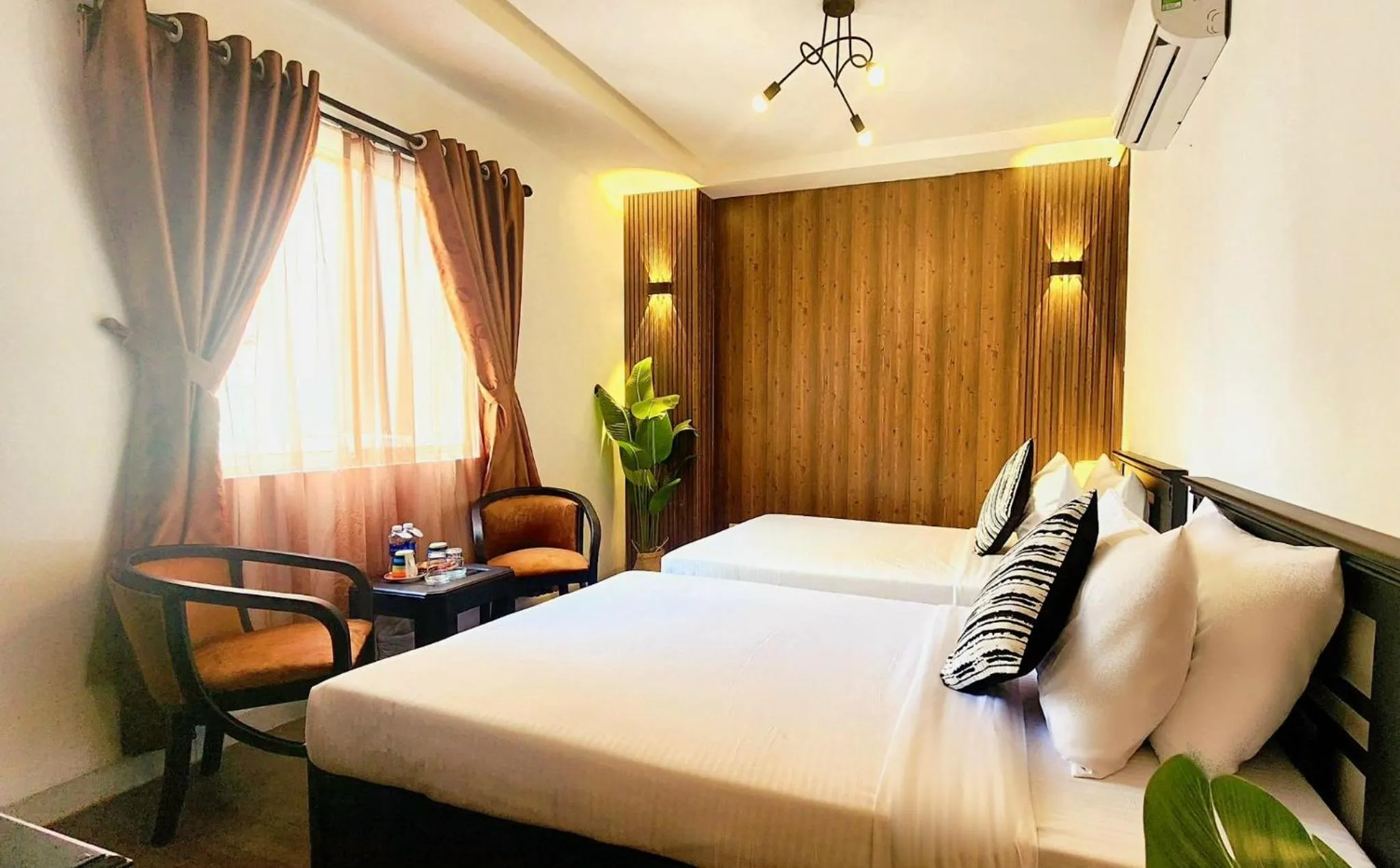 Bed in Rosa May Hotel
