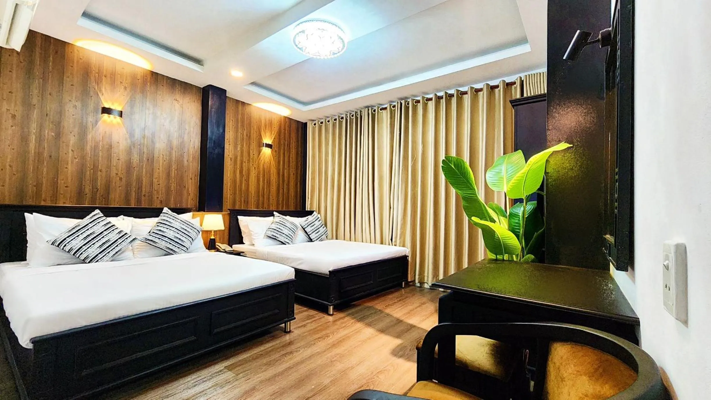 Bed in Rosa May Hotel