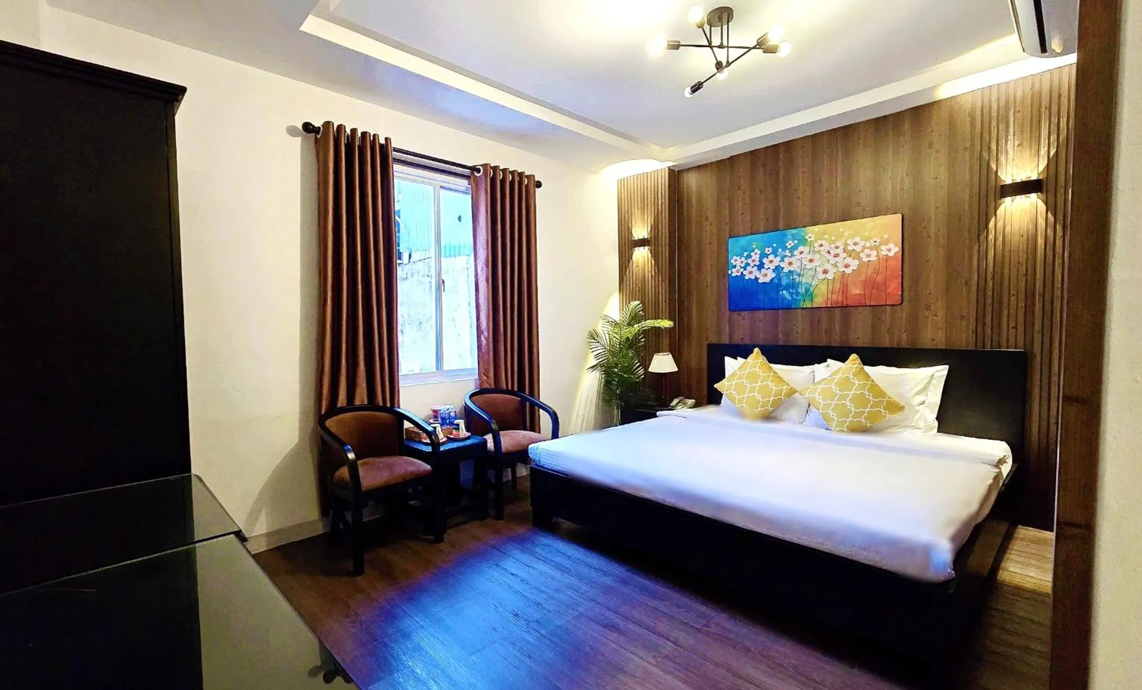 Bed in Rosa May Hotel