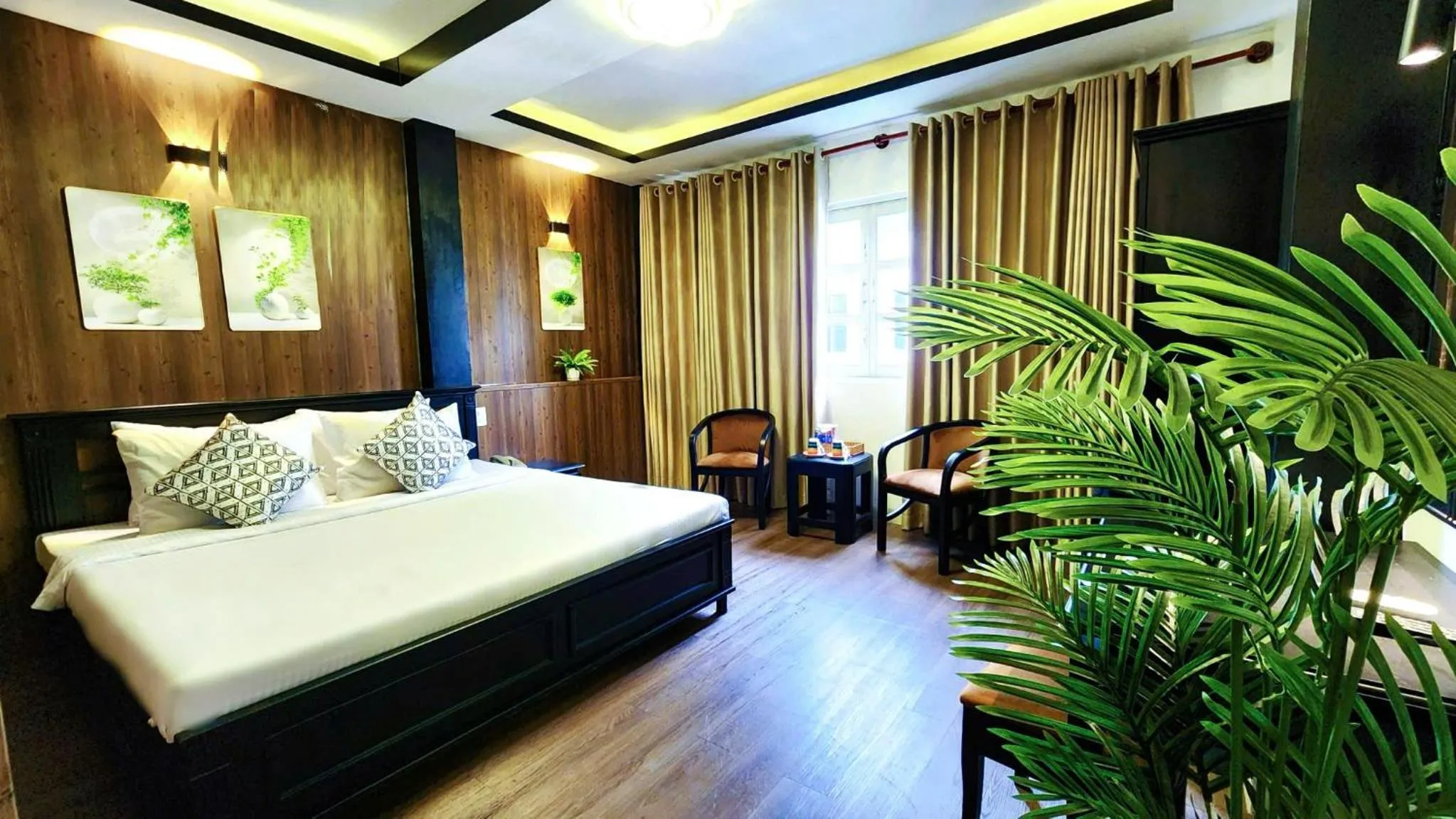 Bed in Rosa May Hotel