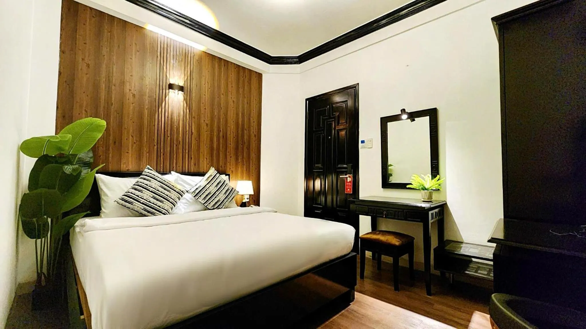 Bed in Rosa May Hotel