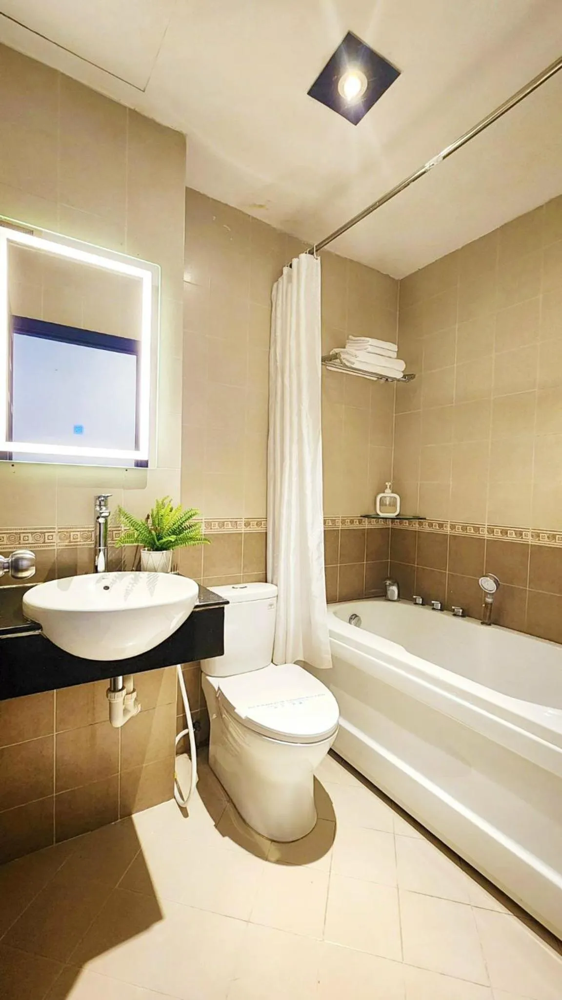 Bathroom in Rosa May Hotel