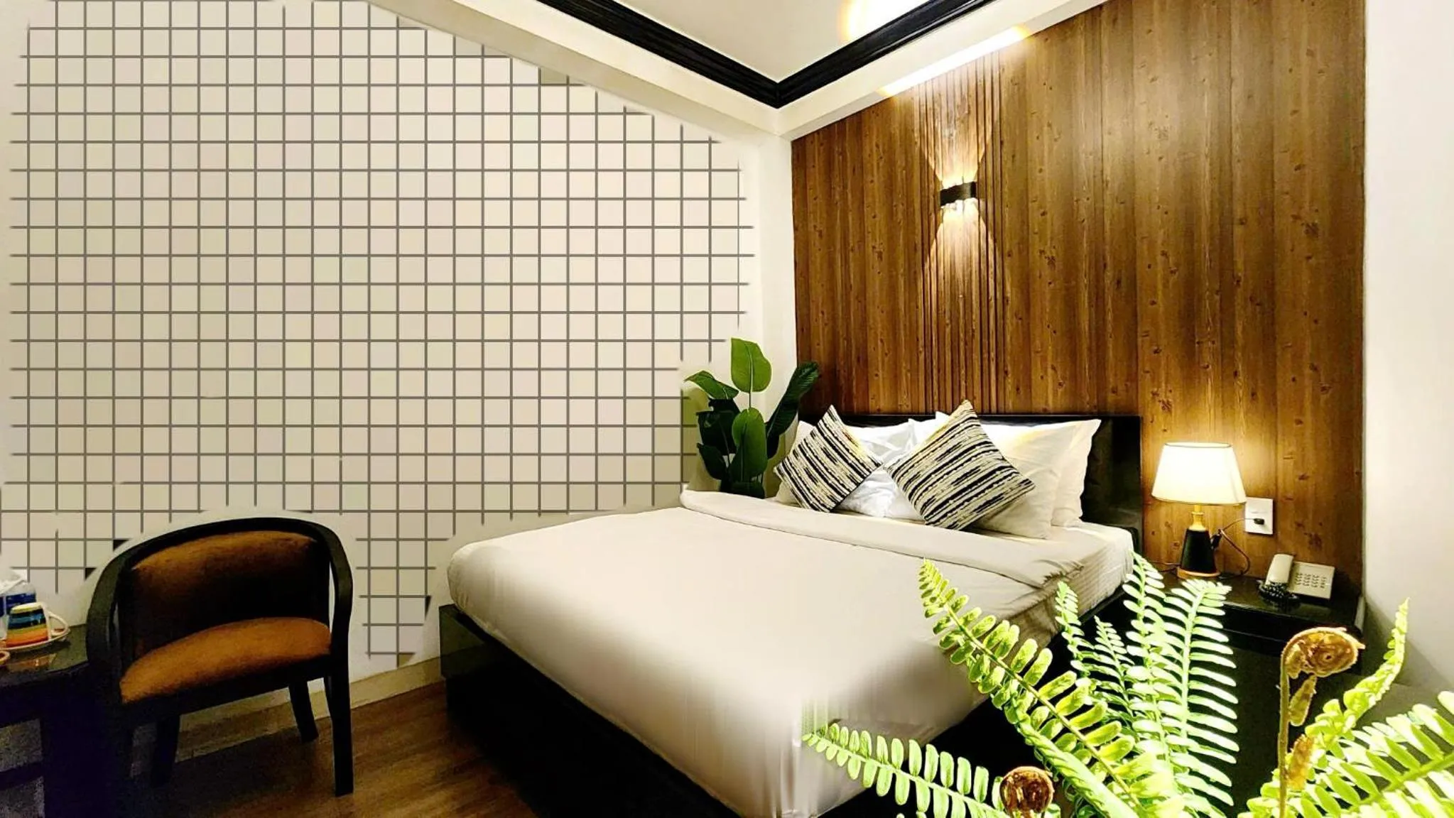 Bed in Rosa May Hotel