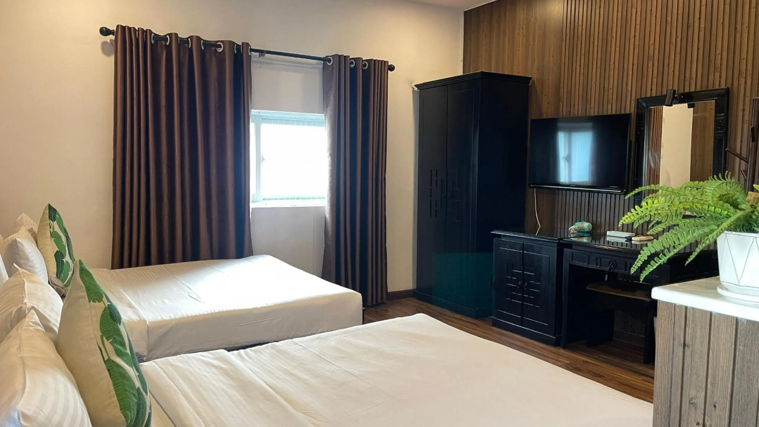 Bed in Rosa May Hotel