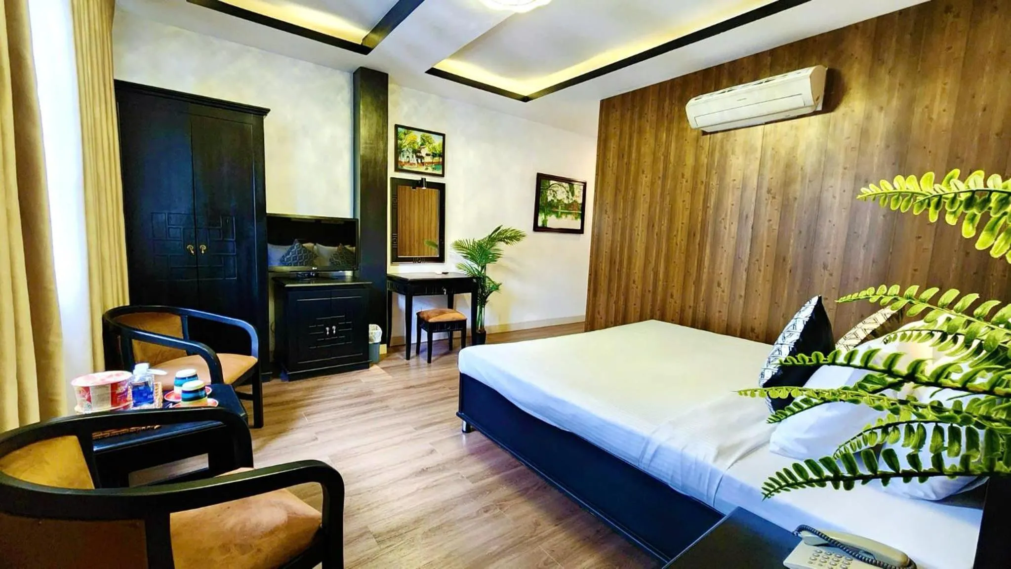 Bed in Rosa May Hotel