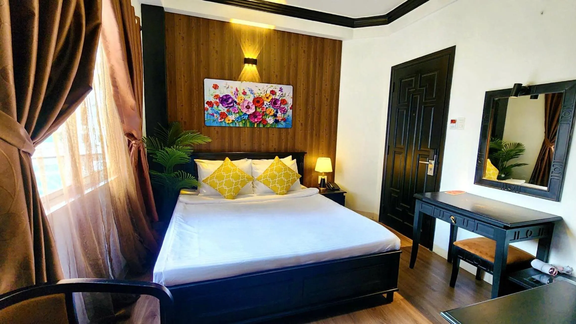 Bed in Rosa May Hotel