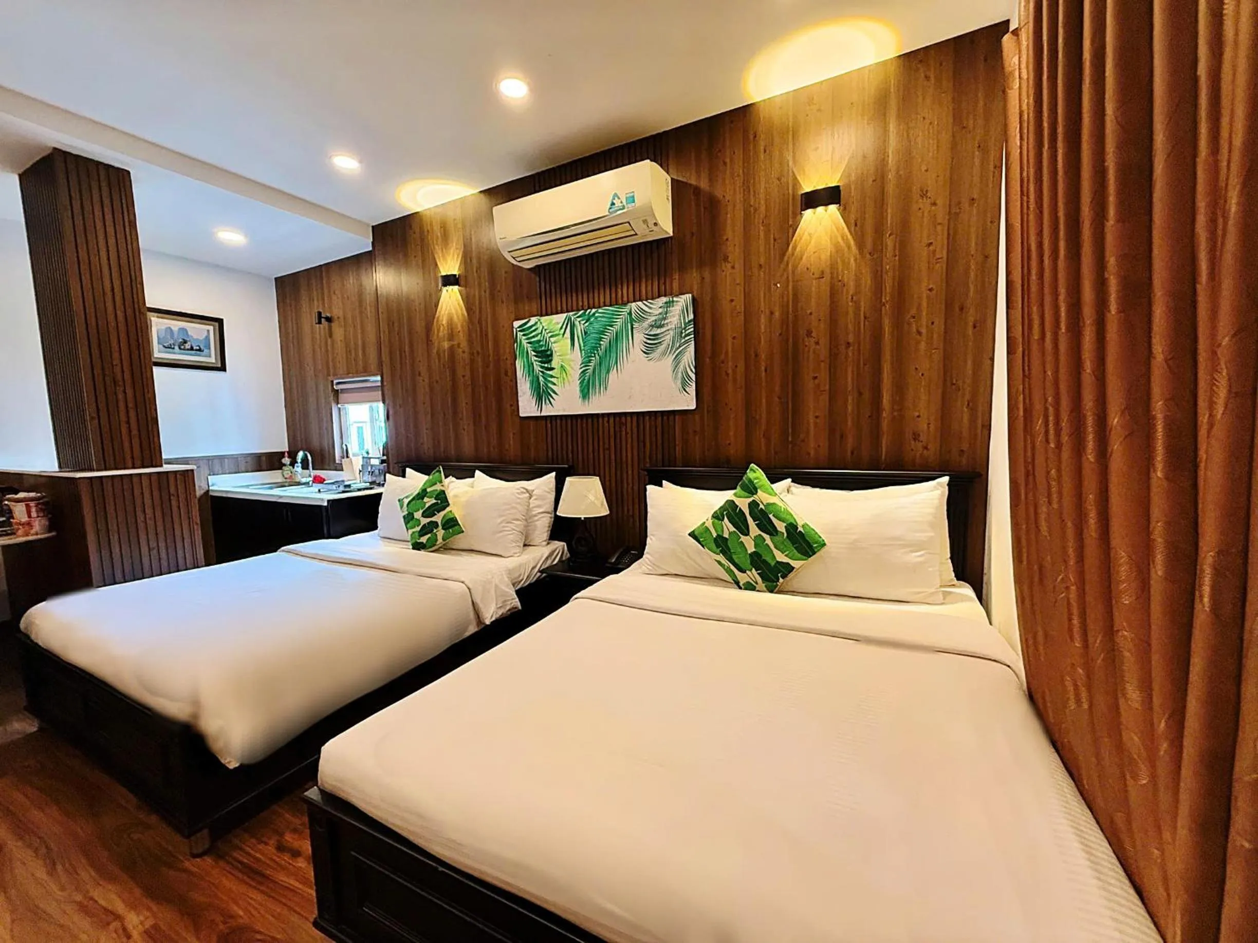 Bed in Rosa May Hotel