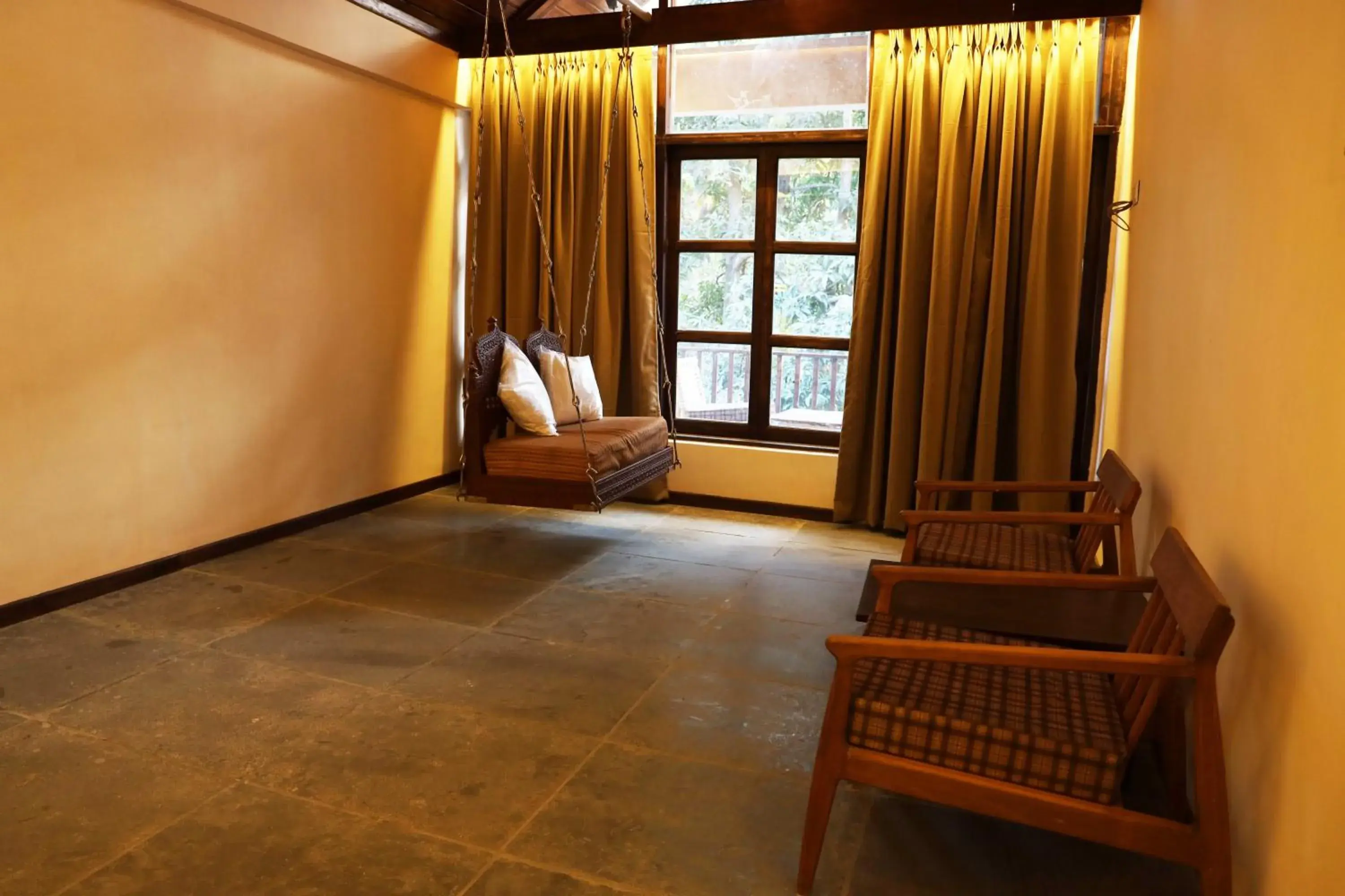 Living room in Avhyay Resort Living room in Avhyay Resort