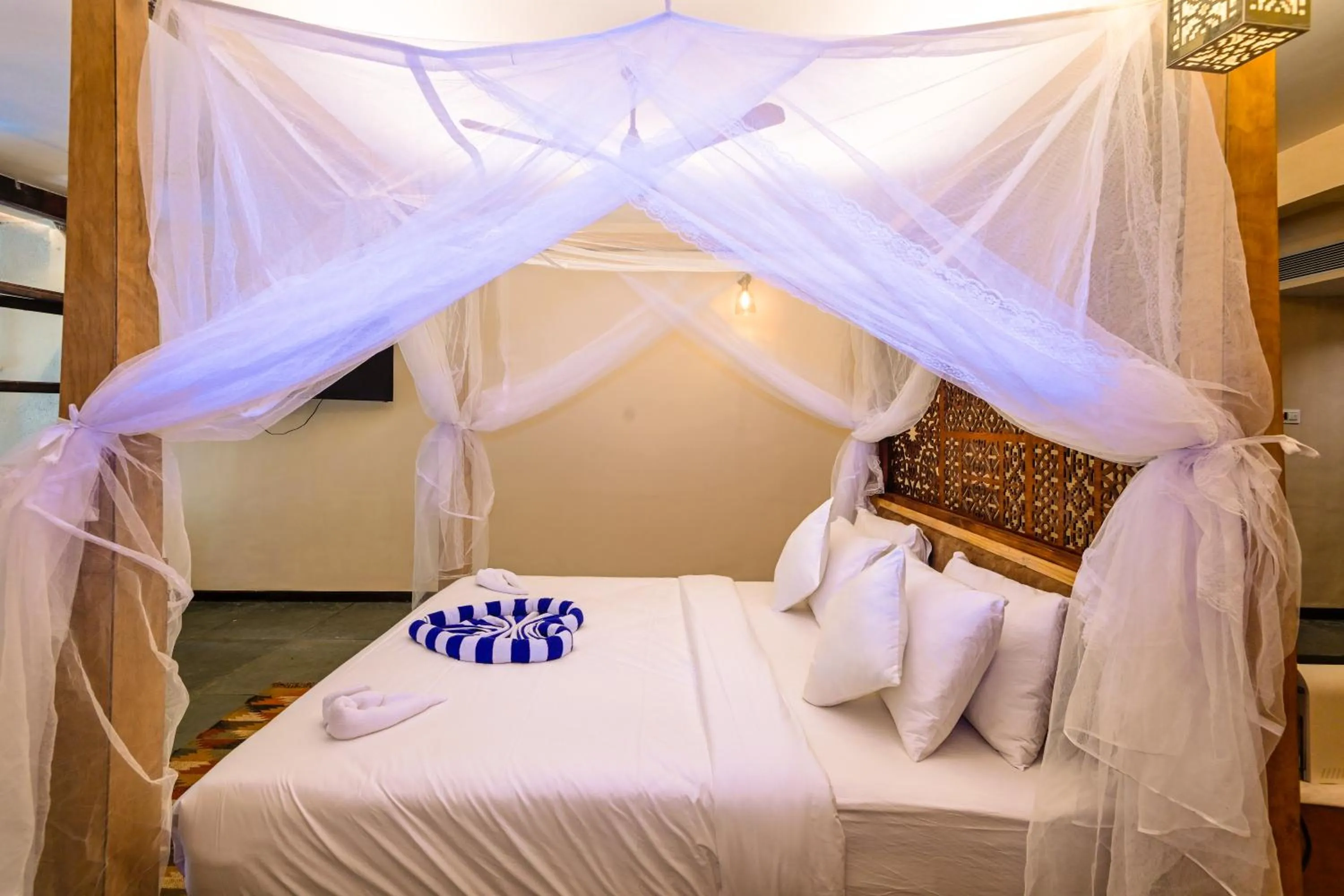 Bed in Avhyay Resort