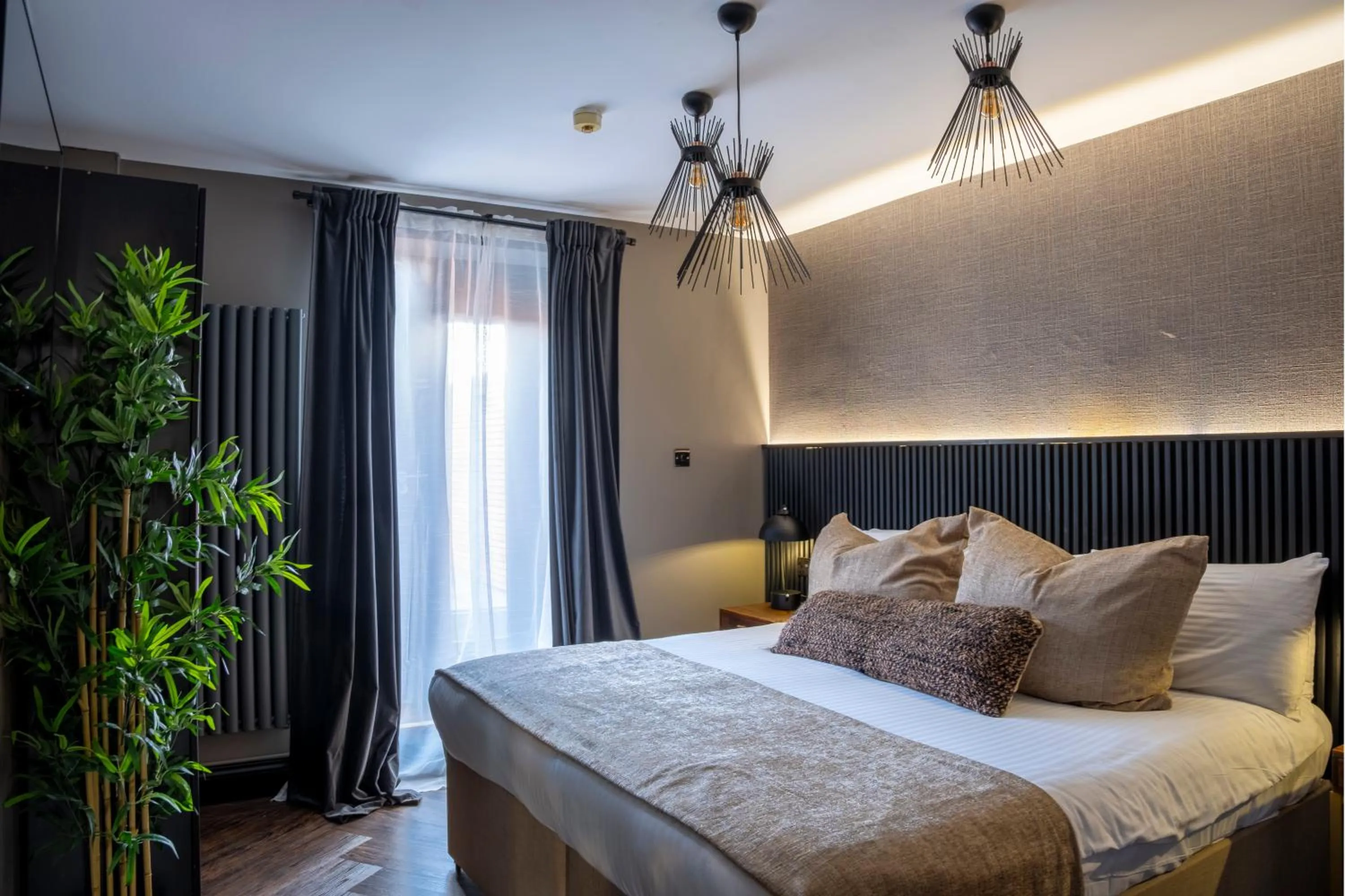 Bed in Derwent Manor Boutique Hotel