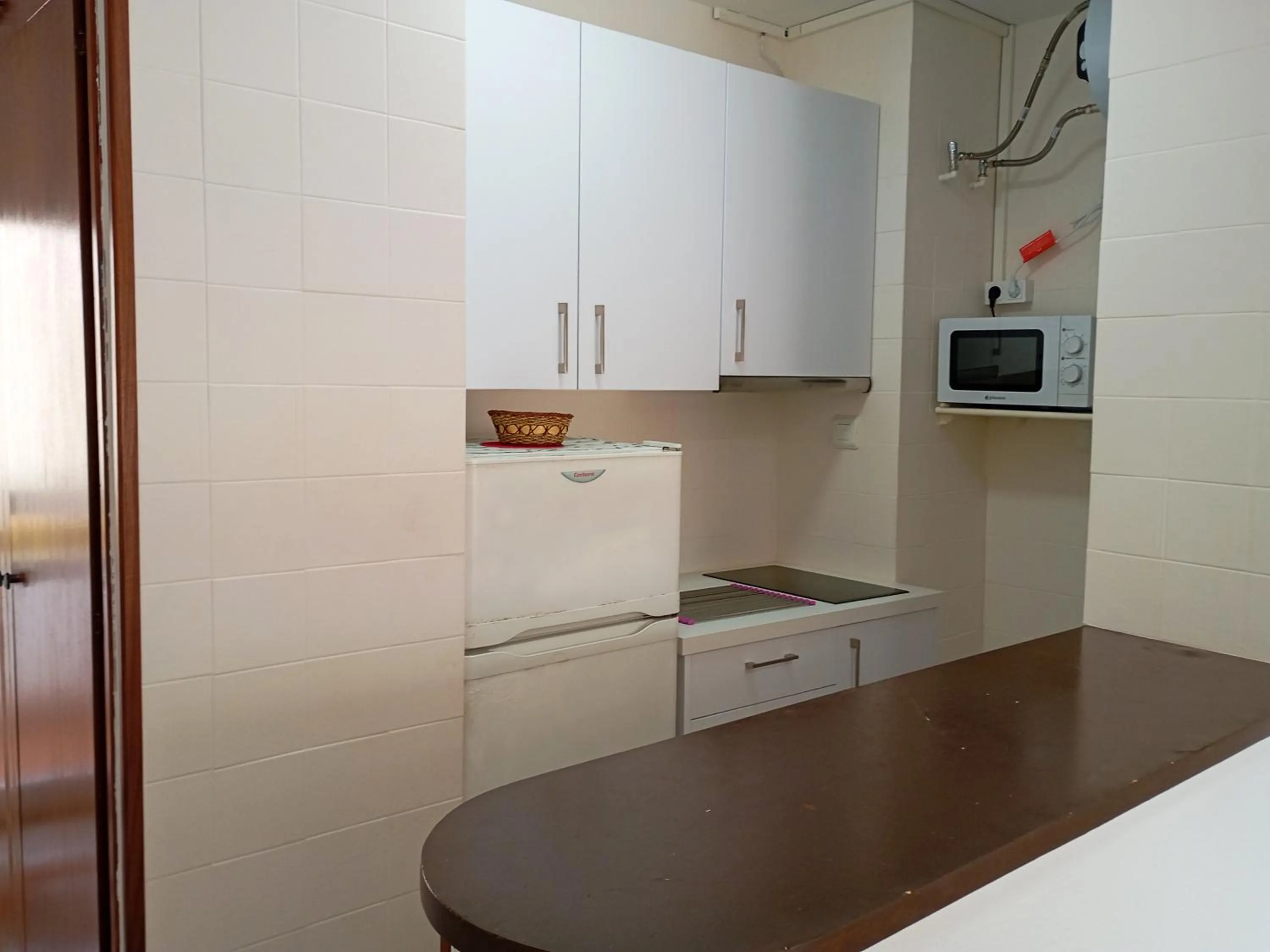 Kitchen or kitchenette in Apartamentos Voramar Peñíscola 3000