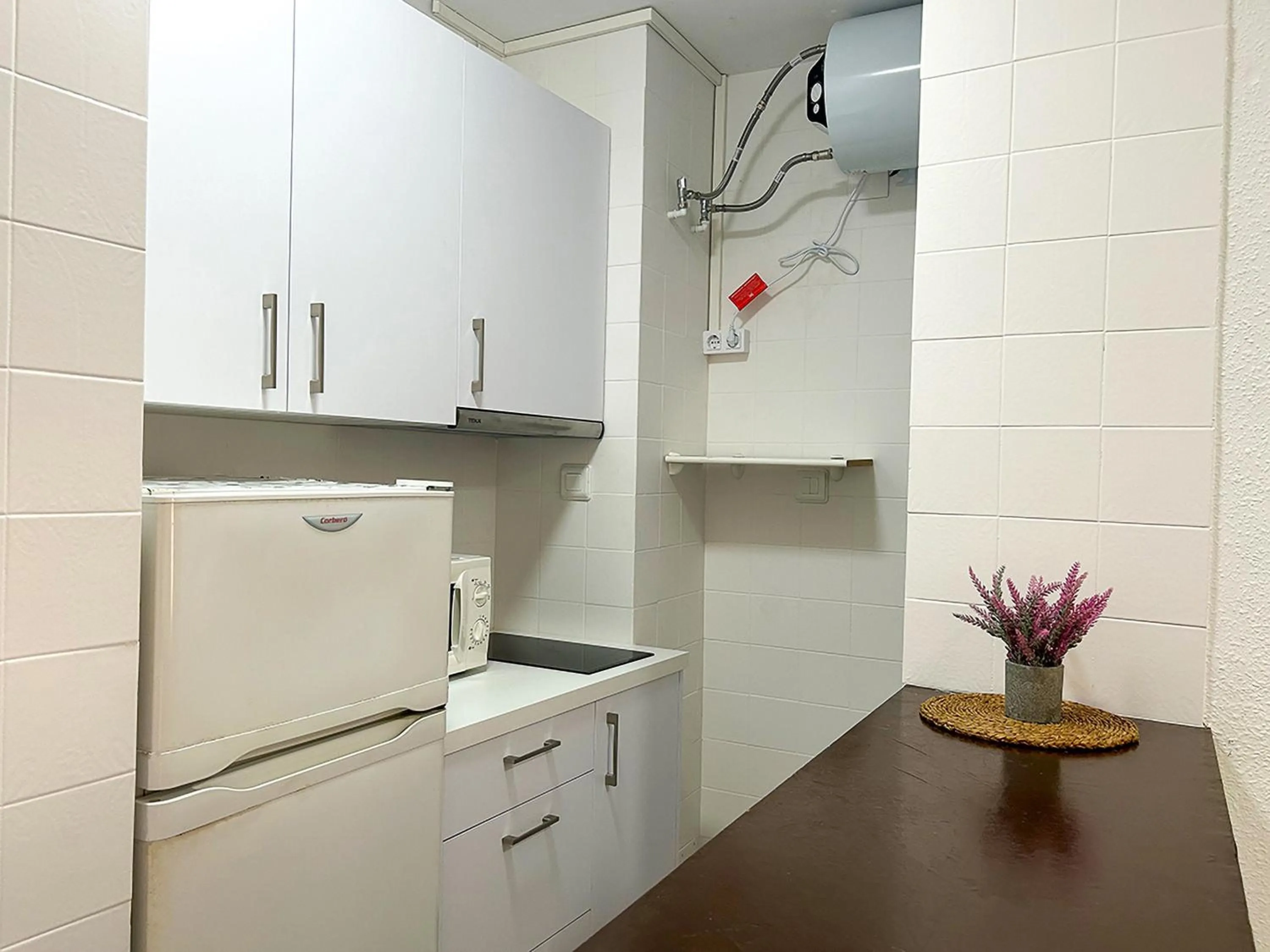 Kitchen or kitchenette in Apartamentos Voramar Peñíscola 3000