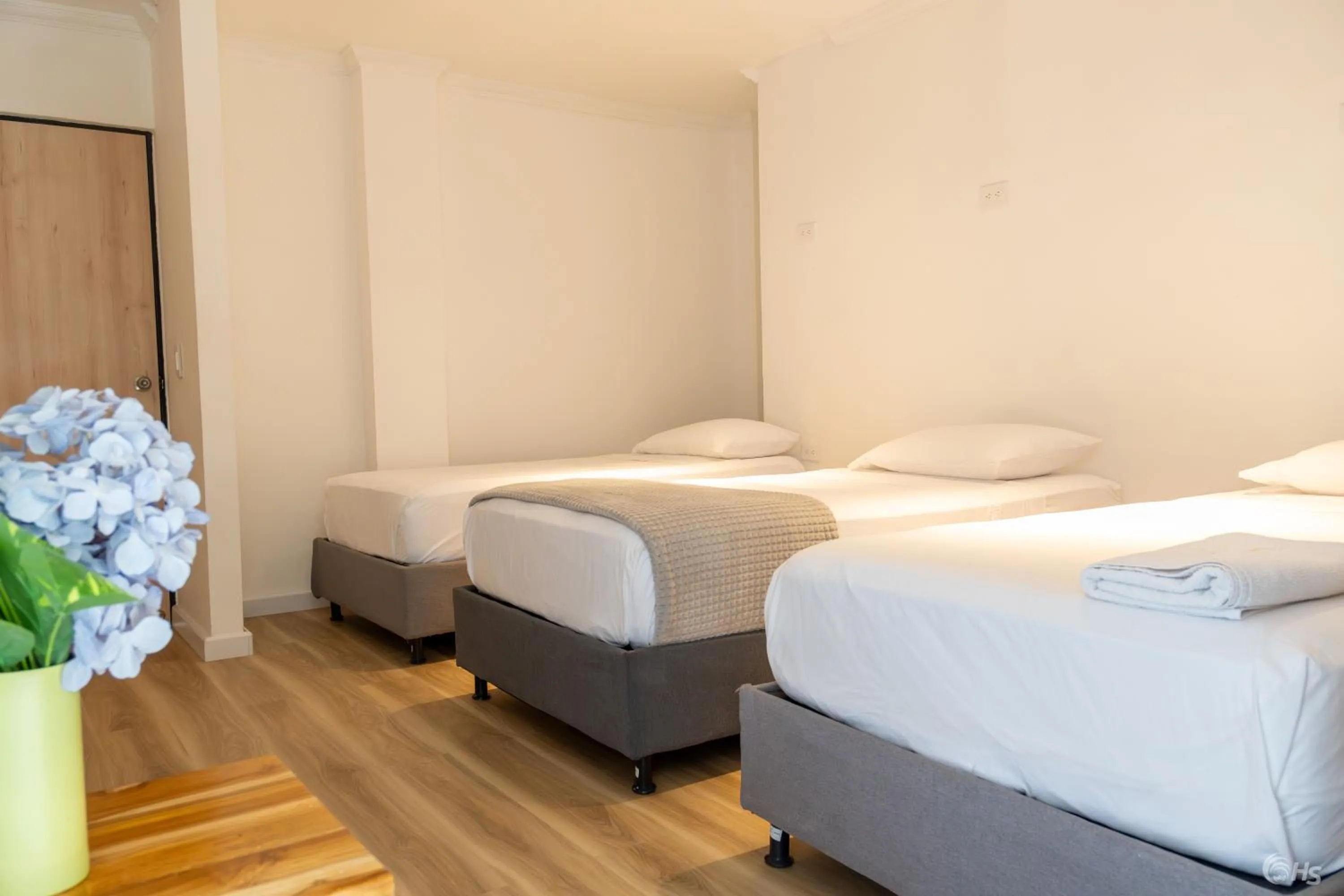 Bed in Casana Rosa Hotel