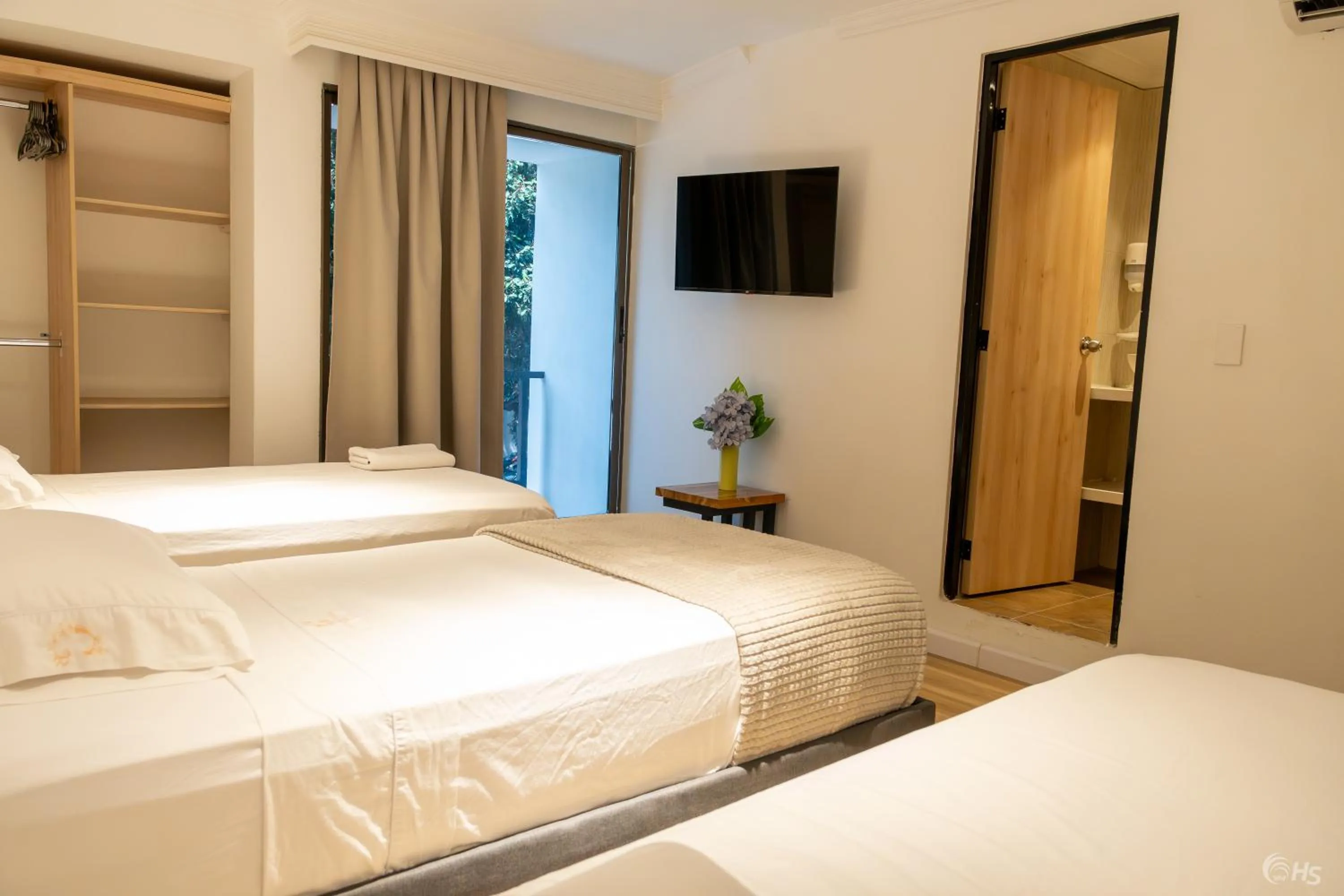 Bed in Casana Rosa Hotel