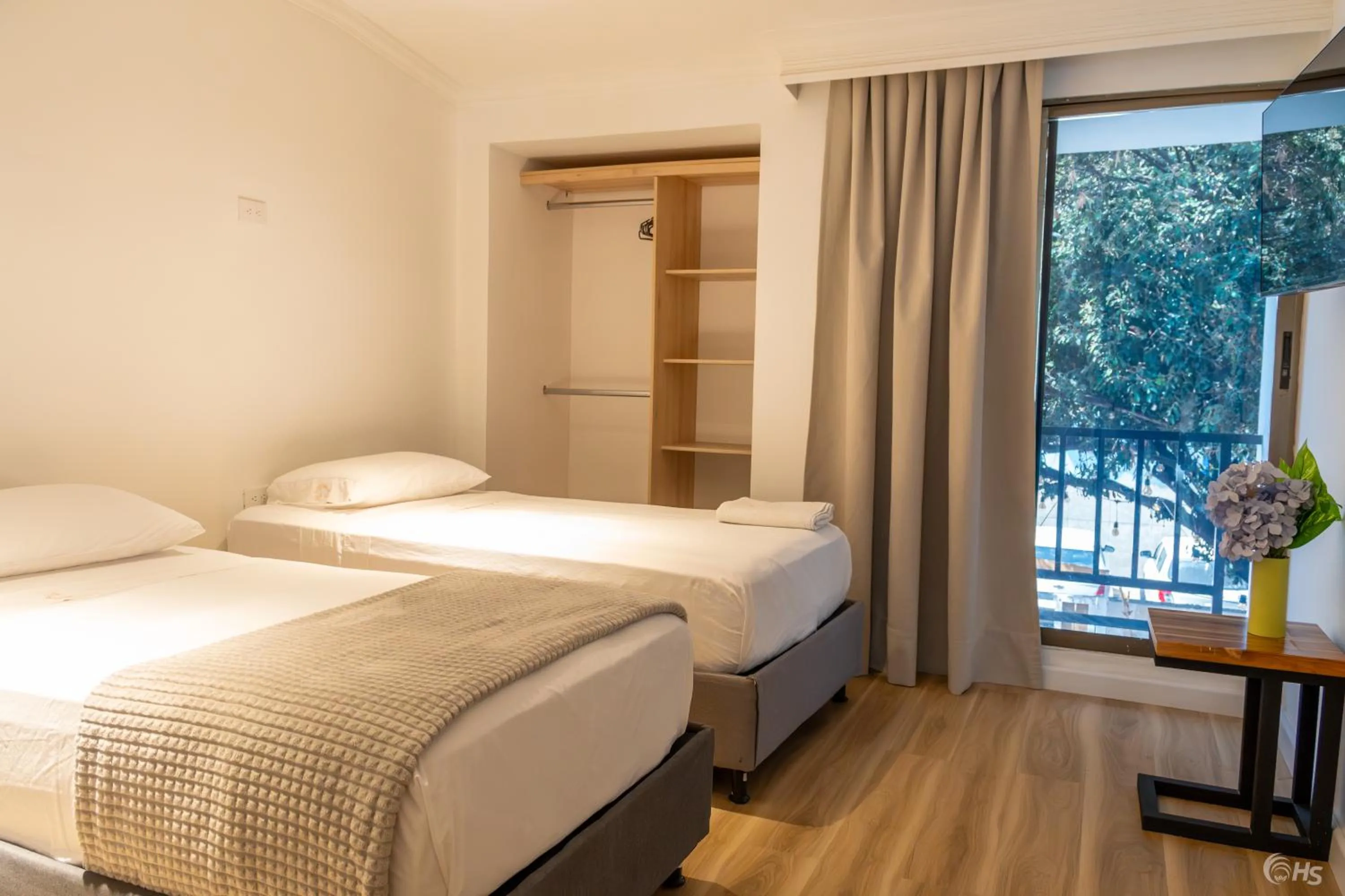 Bed in Casana Rosa Hotel