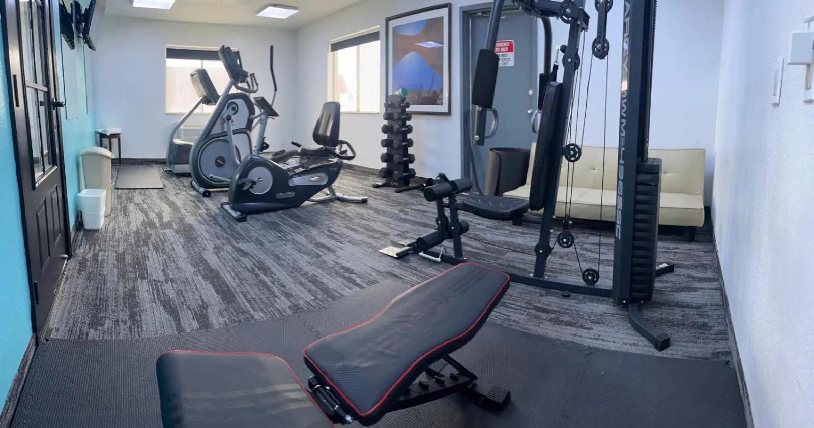 Fitness centre/facilities in Alliance Hotel & Suites, a Howard Johnson by Wyndham