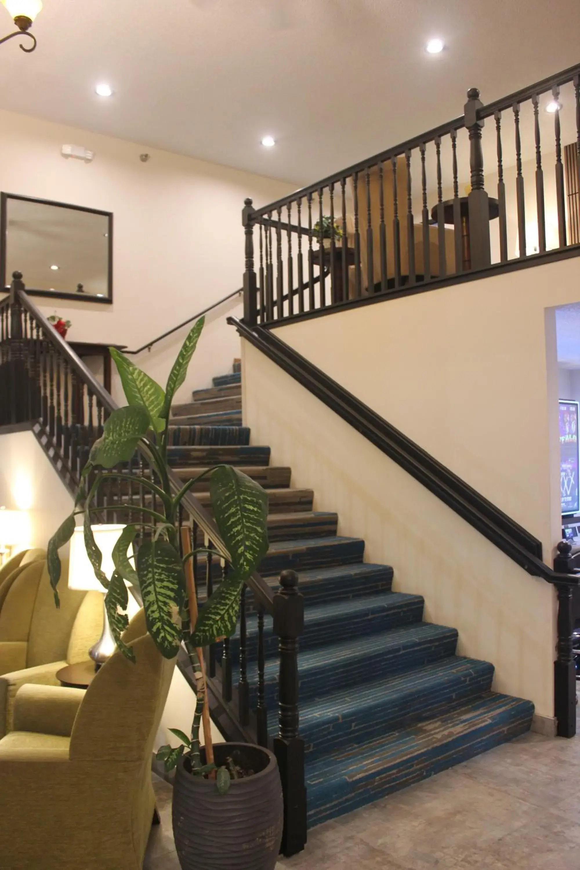 Lobby or reception in Alliance Hotel & Suites, a Howard Johnson by Wyndham Lobby or reception in Alliance Hotel & Suites, a Howard Johnson by Wyndham