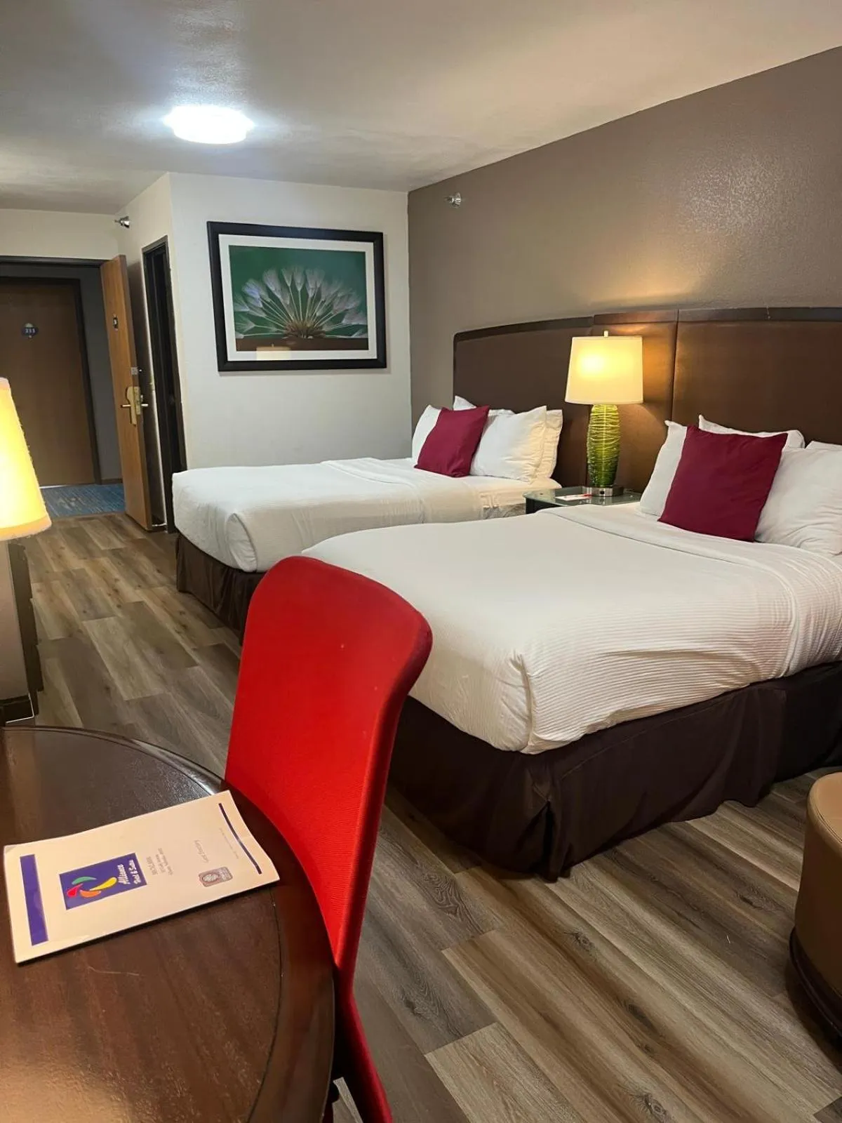 Bedroom, Bed in Alliance Hotel & Suites, a Howard Johnson by Wyndham