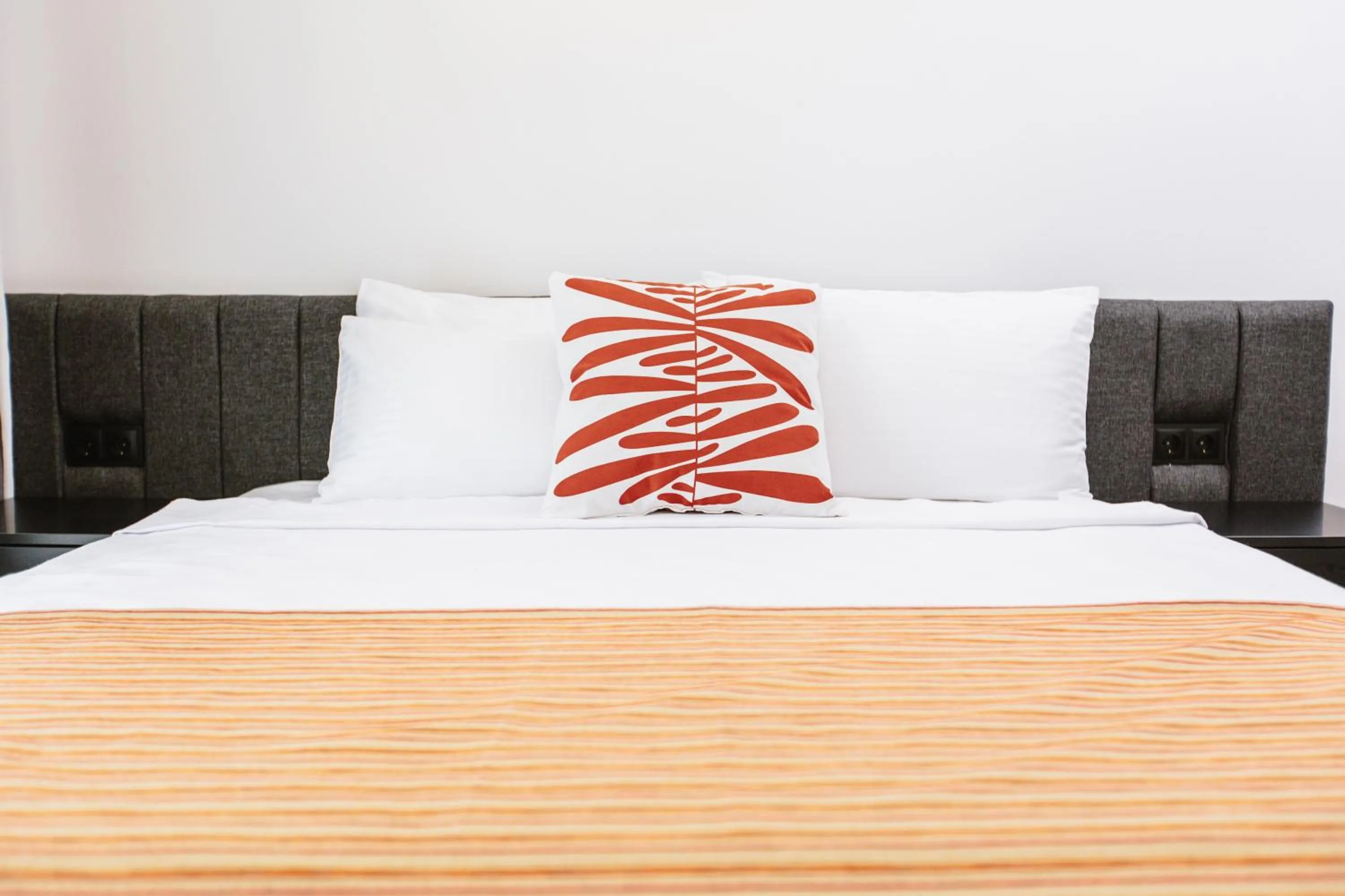 Bed in Ella Suites Hotel