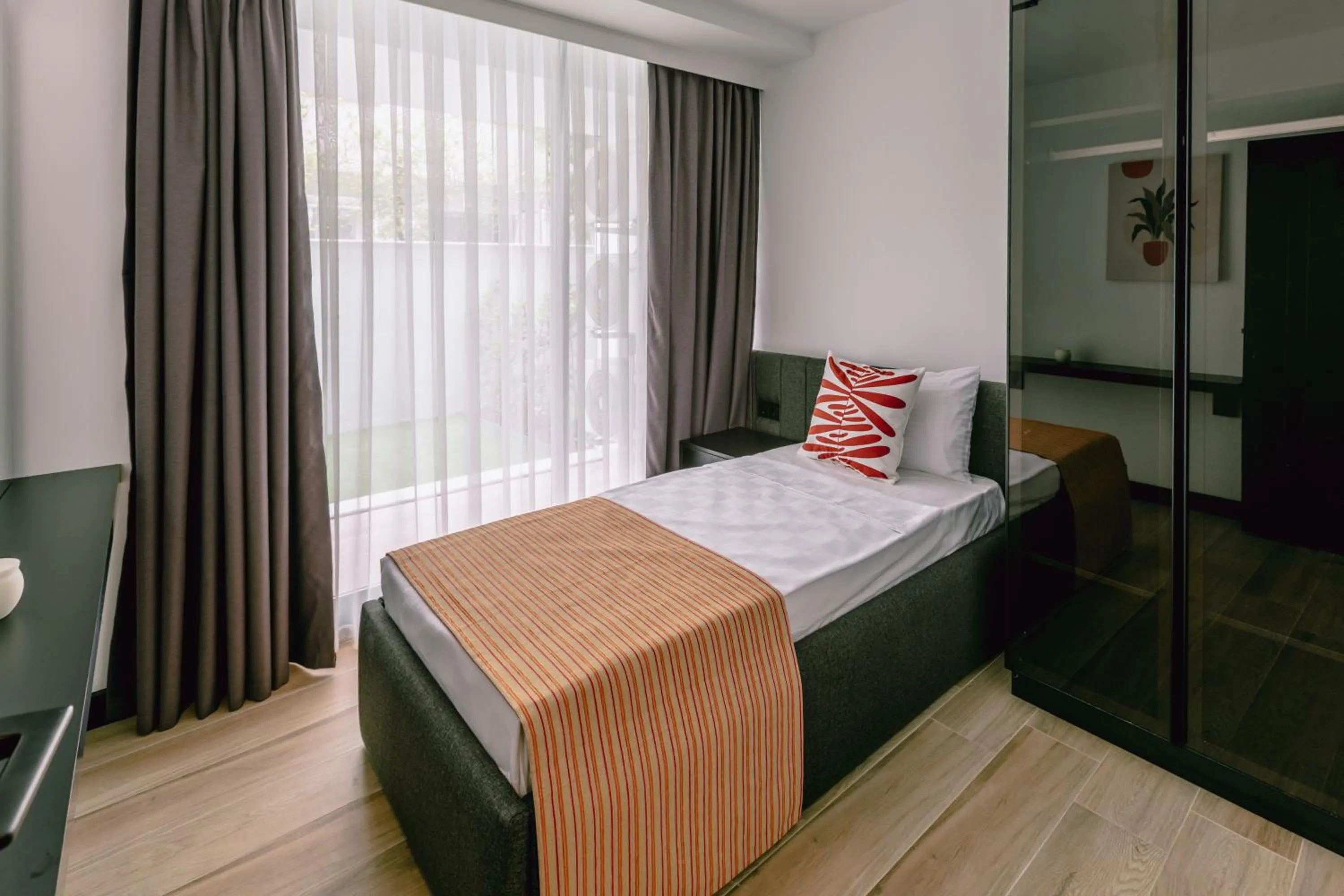 Bed in Ella Suites Hotel