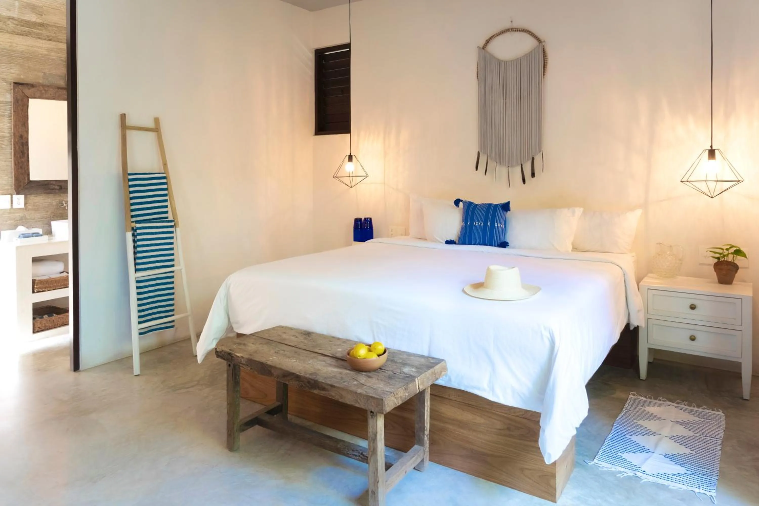 Bed in Lula Tulum, a Small Luxury Hotel