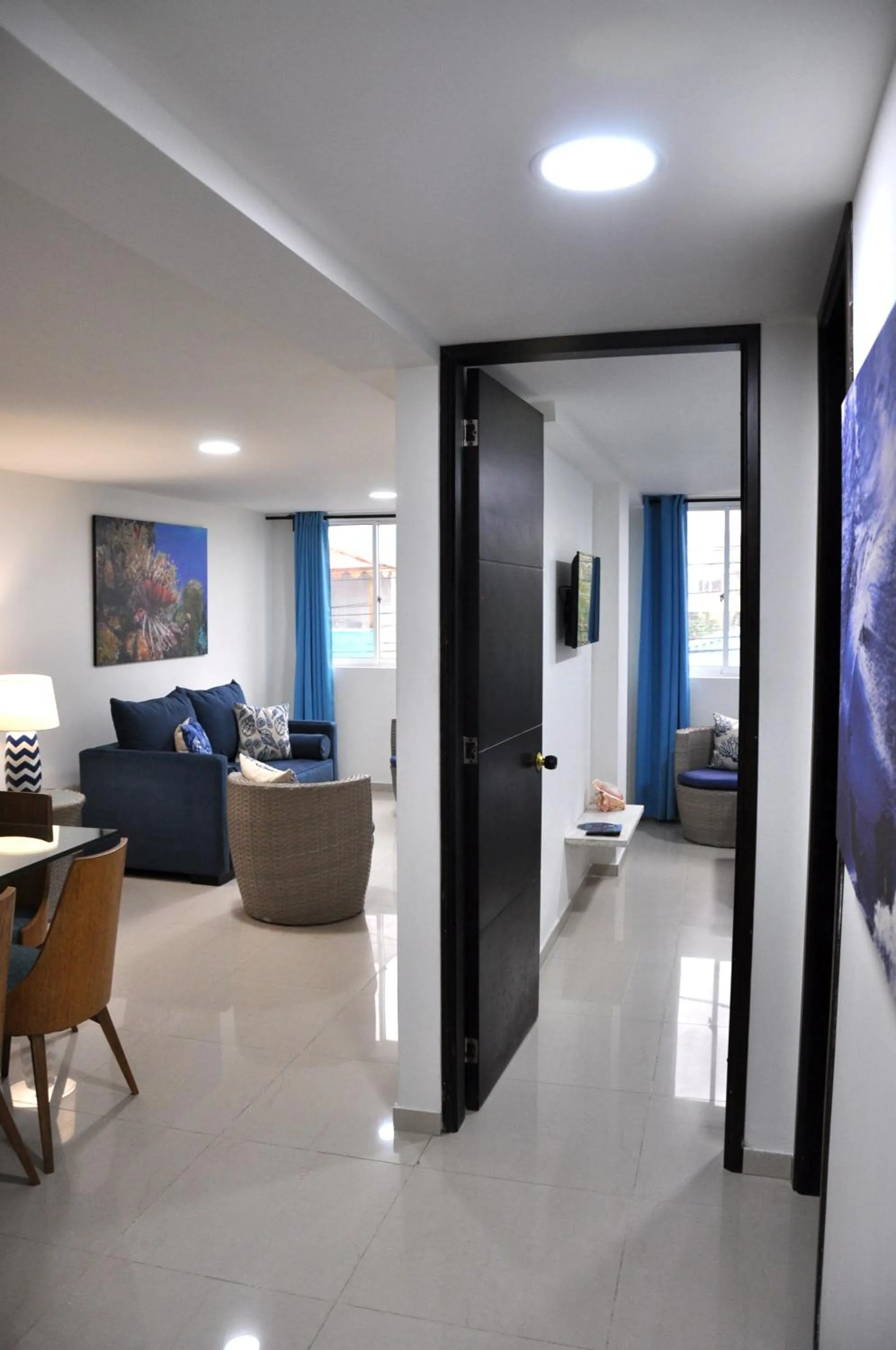 Photo of the whole room, Bed in White Coral ApartaSuites