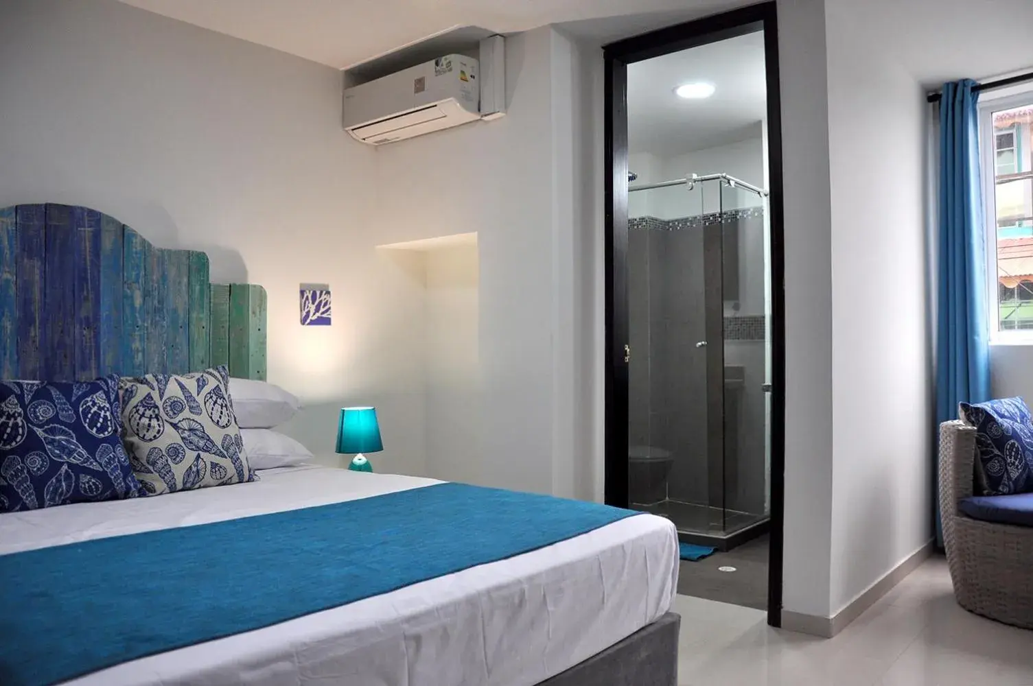 Bed in White Coral ApartaSuites Bed in White Coral ApartaSuites