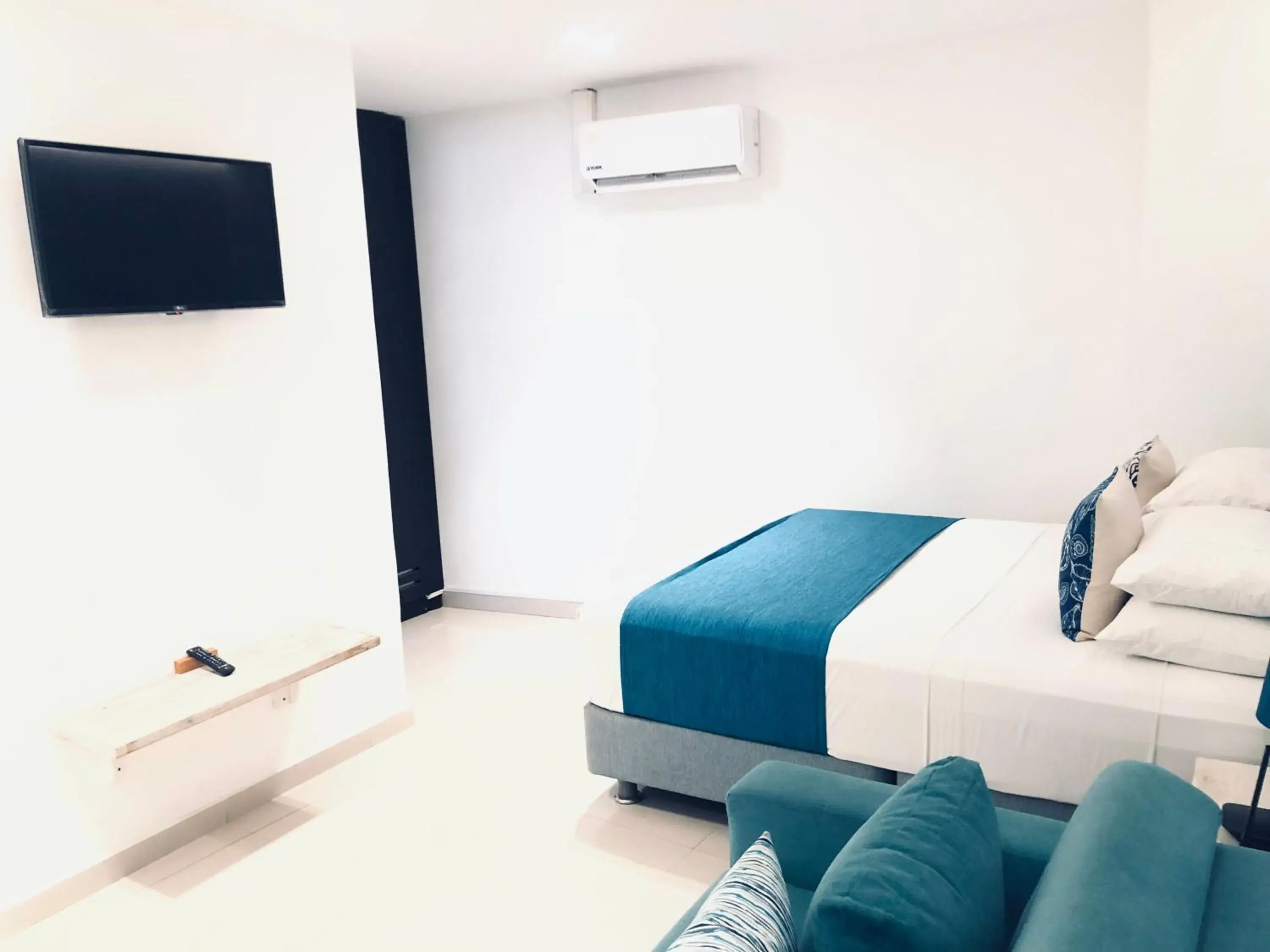 Bedroom in White Coral ApartaSuites Bedroom in White Coral ApartaSuites