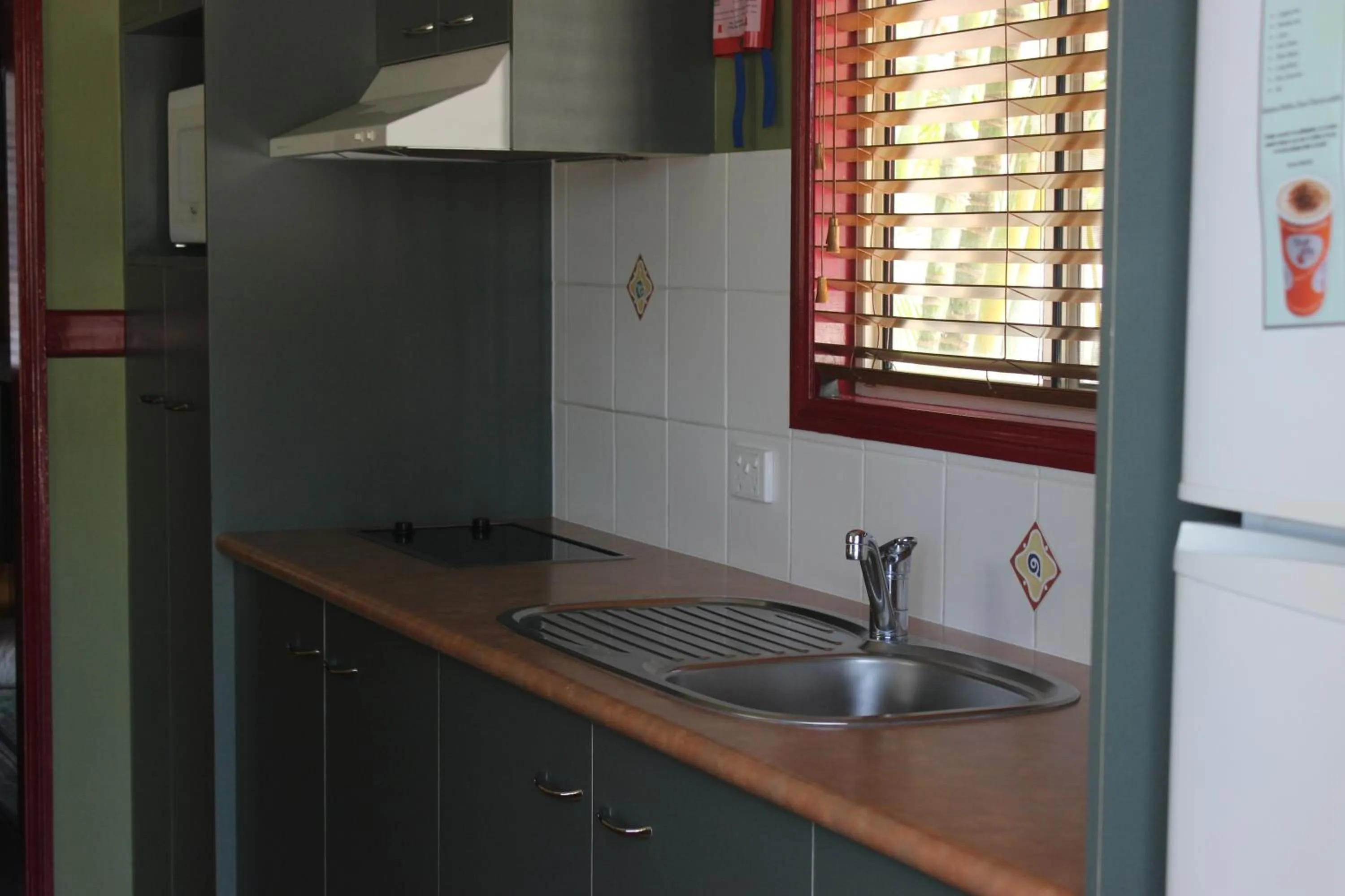 Kitchen or kitchenette in Aussie Outback Oasis Holiday Park