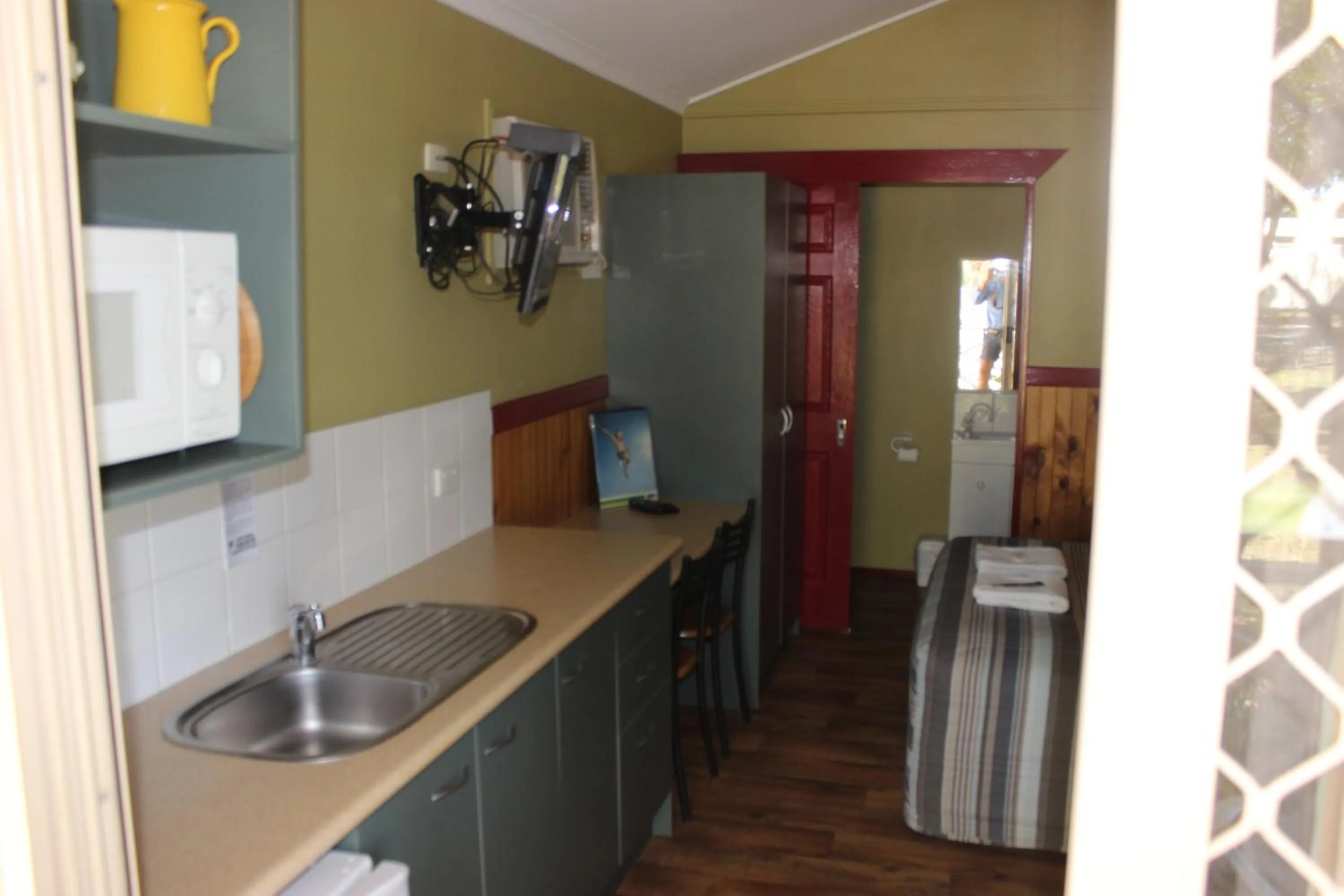 Kitchen or kitchenette in Aussie Outback Oasis Holiday Park