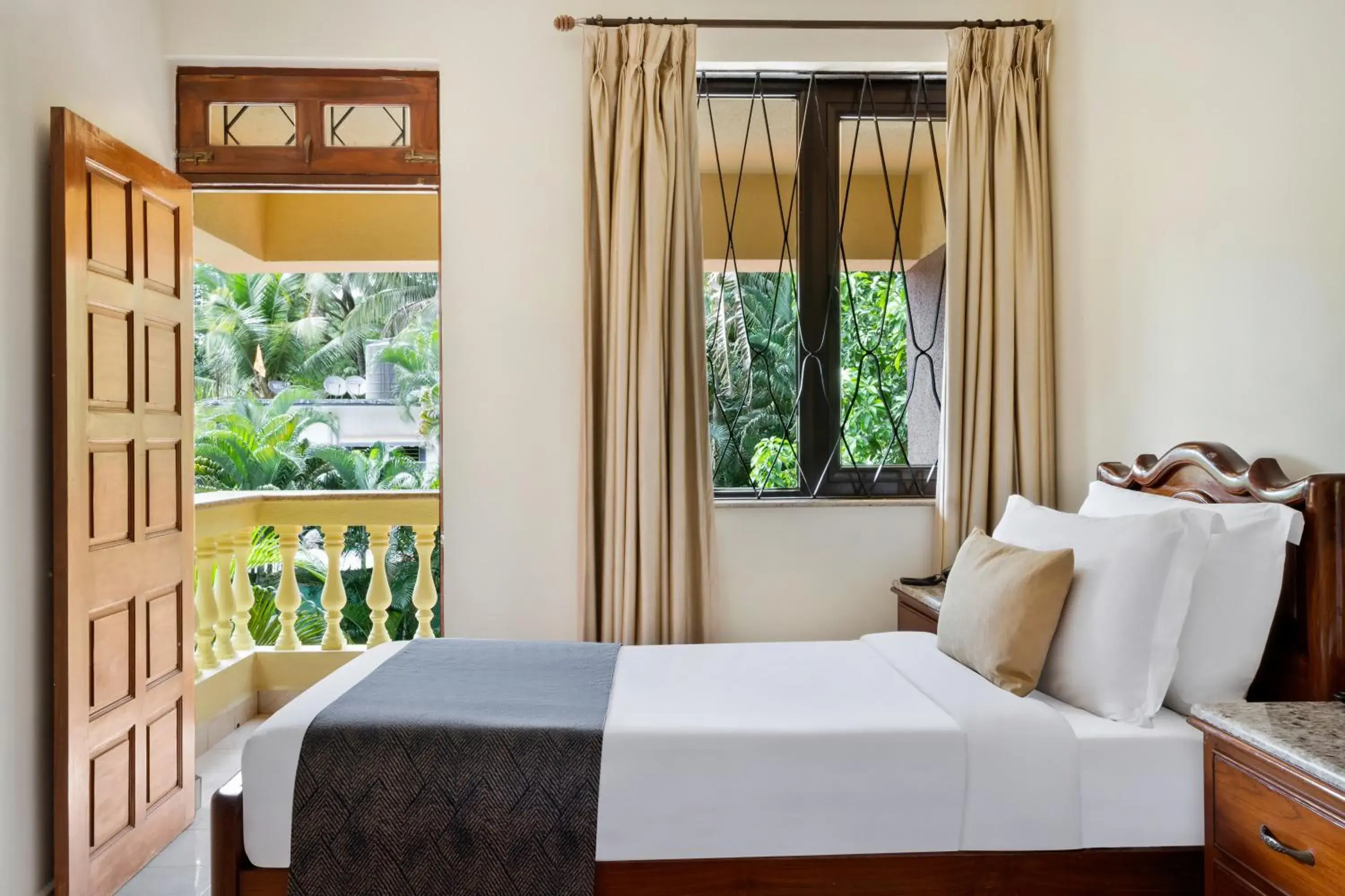 Bed in De Mandarin Beach Resort Suites & Villas, Candolim Bed in De Mandarin Beach Resort Suites & Villas, Candolim
