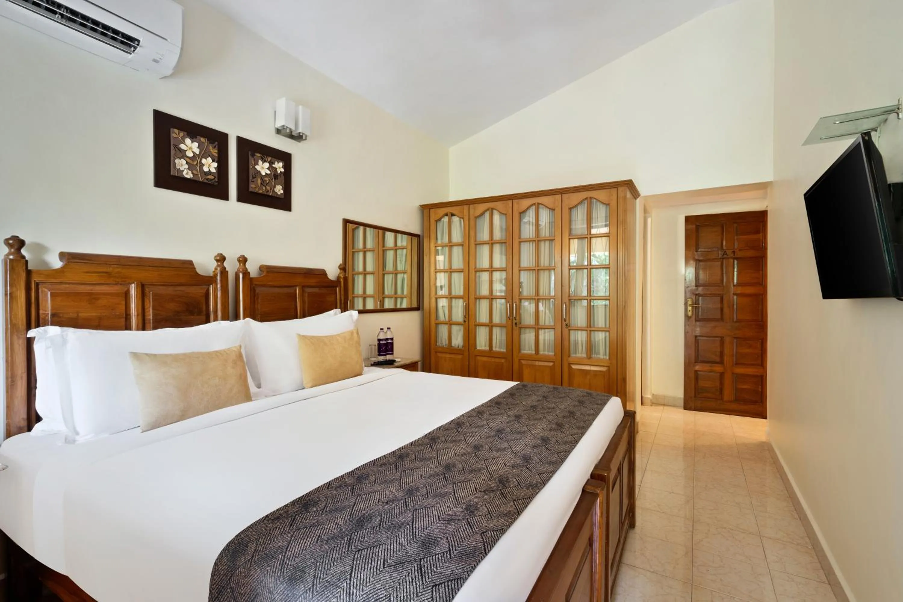 furniture, Bed in De Mandarin Beach Resort Suites & Villas, Candolim