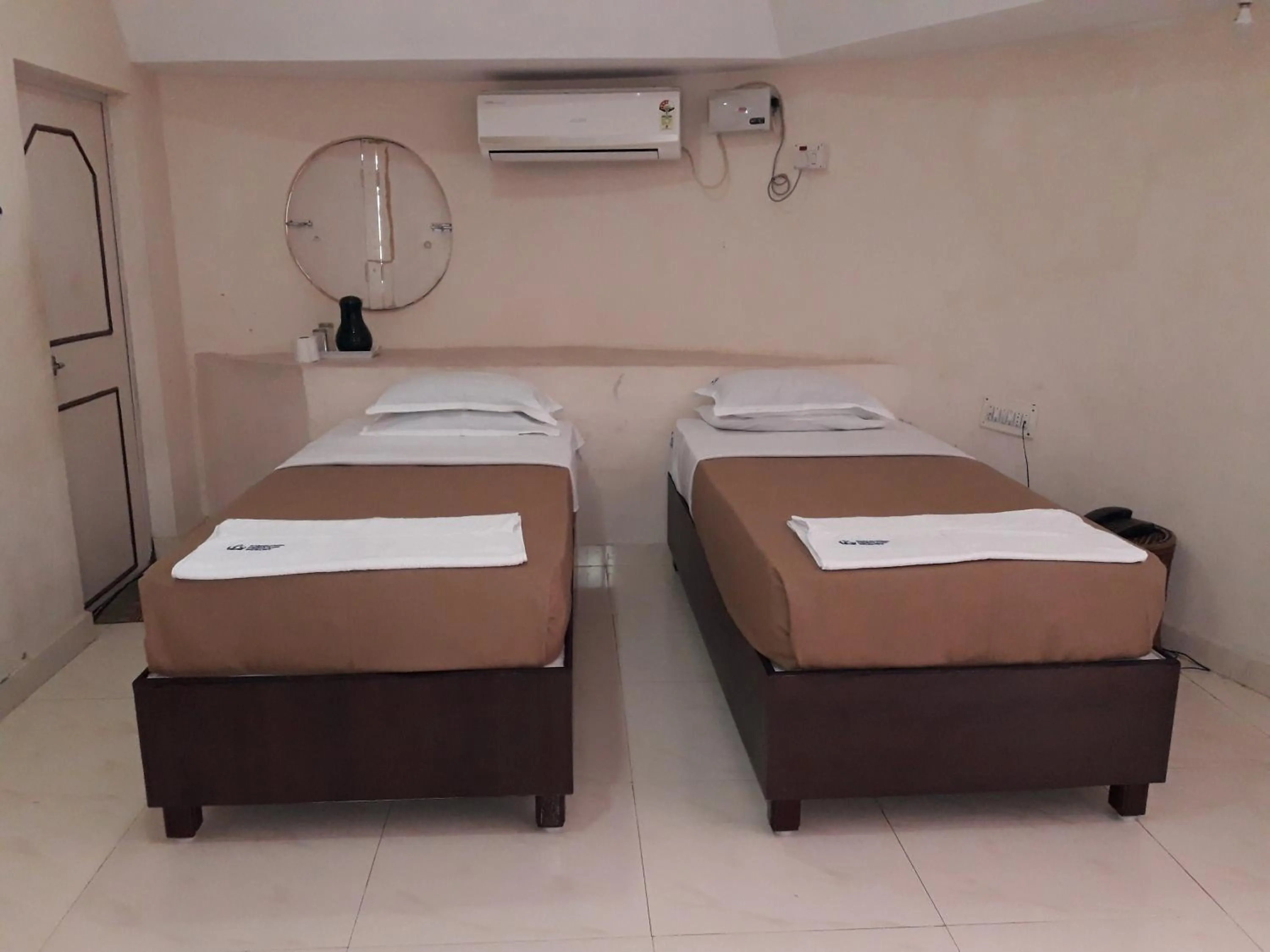 Bedroom in Kishkinda Heritage Resort