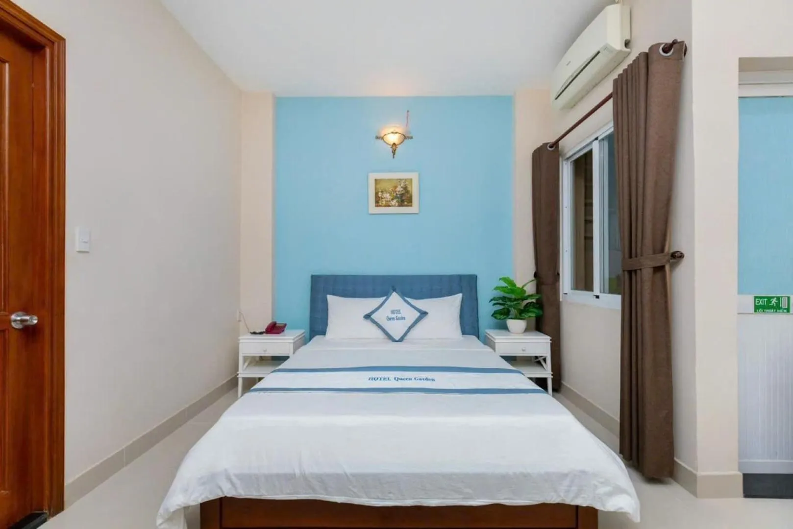 Bed in Queen Garden Hotel & Apartment