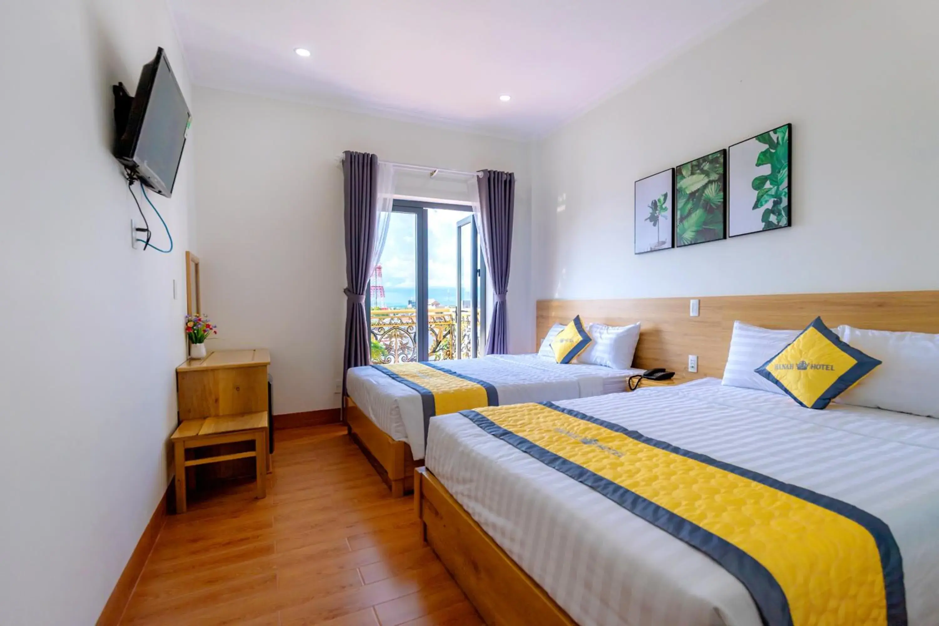 Quadruple Room with Balcony in Hanah Hotel Phan Thiet Quadruple Room with Balcony in Hanah Hotel Phan Thiet