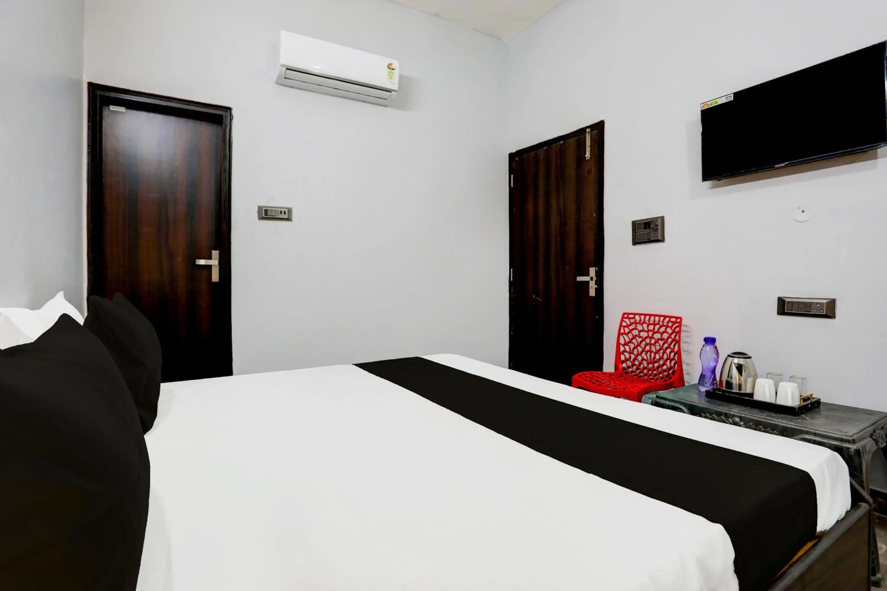 Bedroom in Hotel O 4 Square Residency