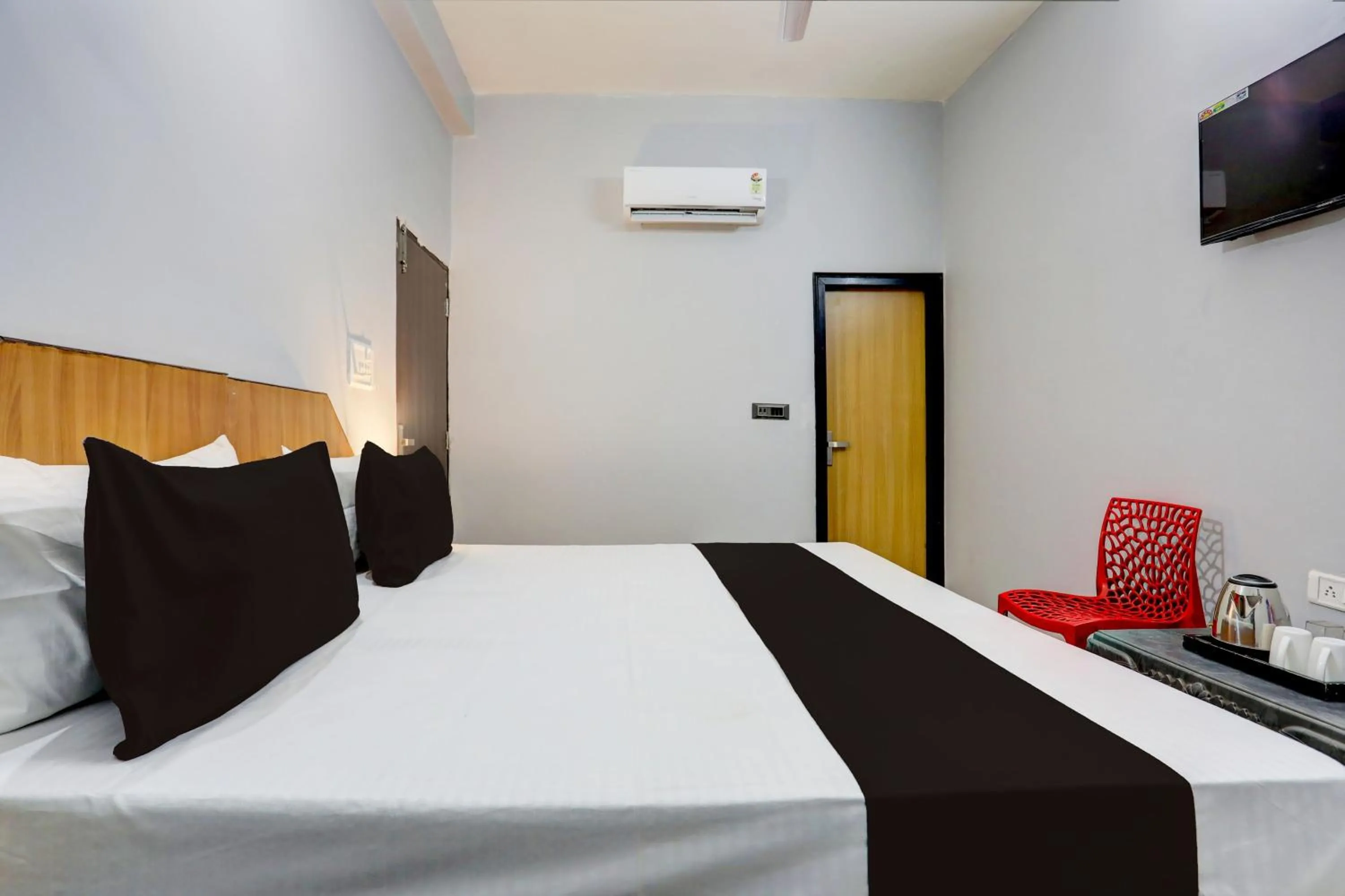 Bedroom in Hotel O 4 Square Residency