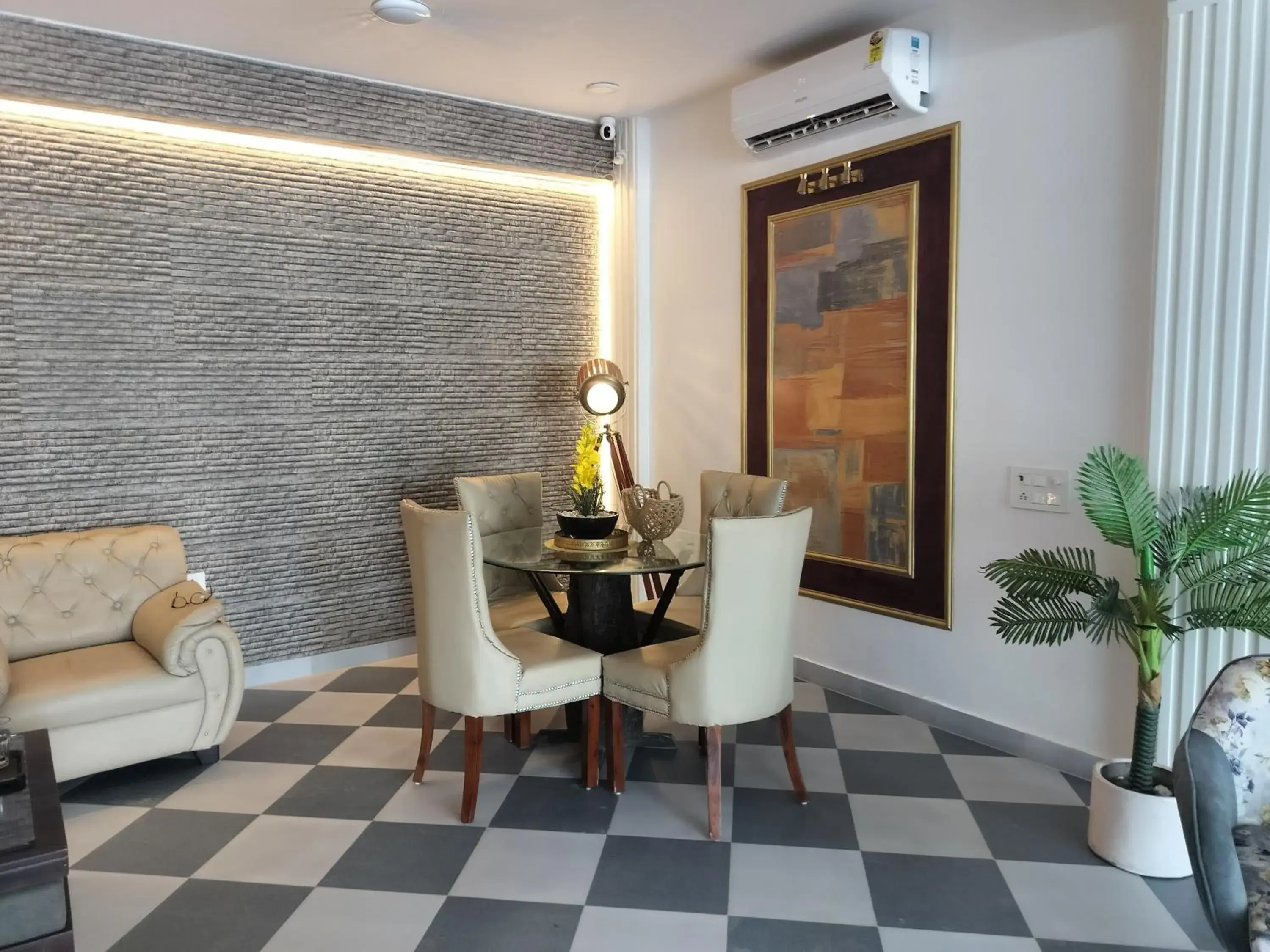 Living room in Saffron Inn - Expo India Mart Living room in Saffron Inn - Expo India Mart