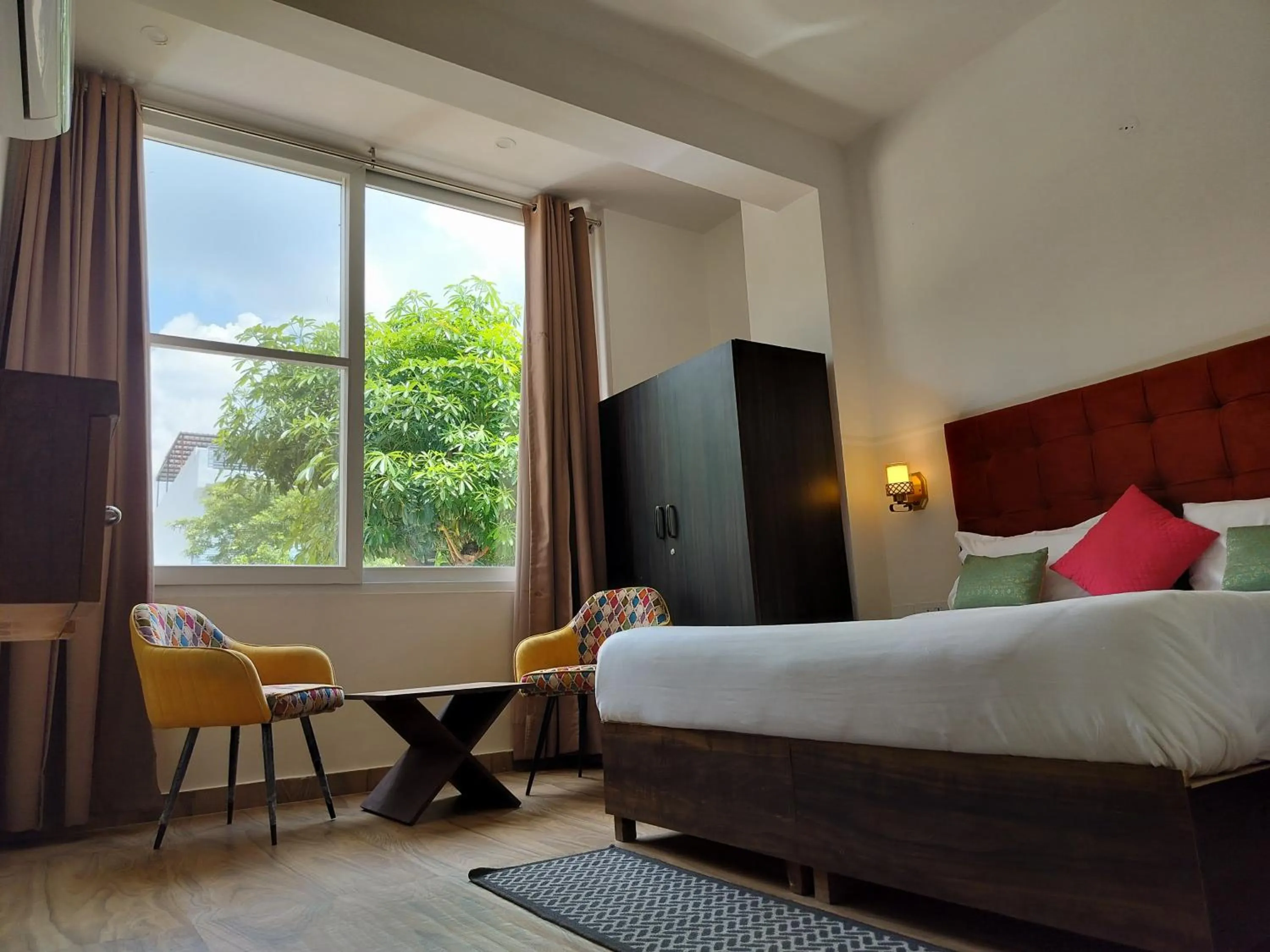 Bedroom, Bed in Saffron Inn - Expo India Mart