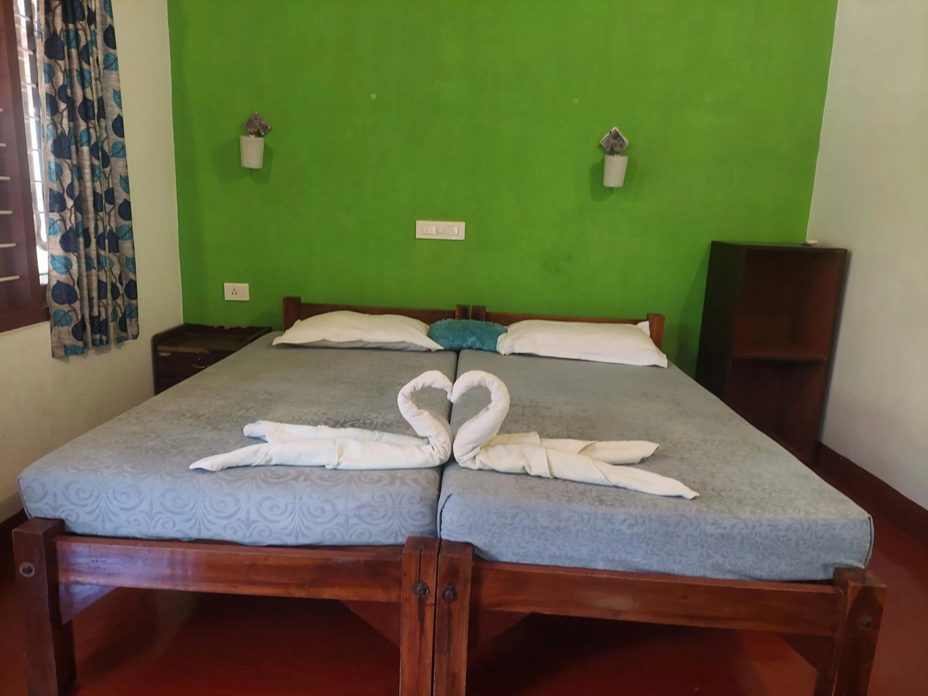 Bed in Marari Beach House