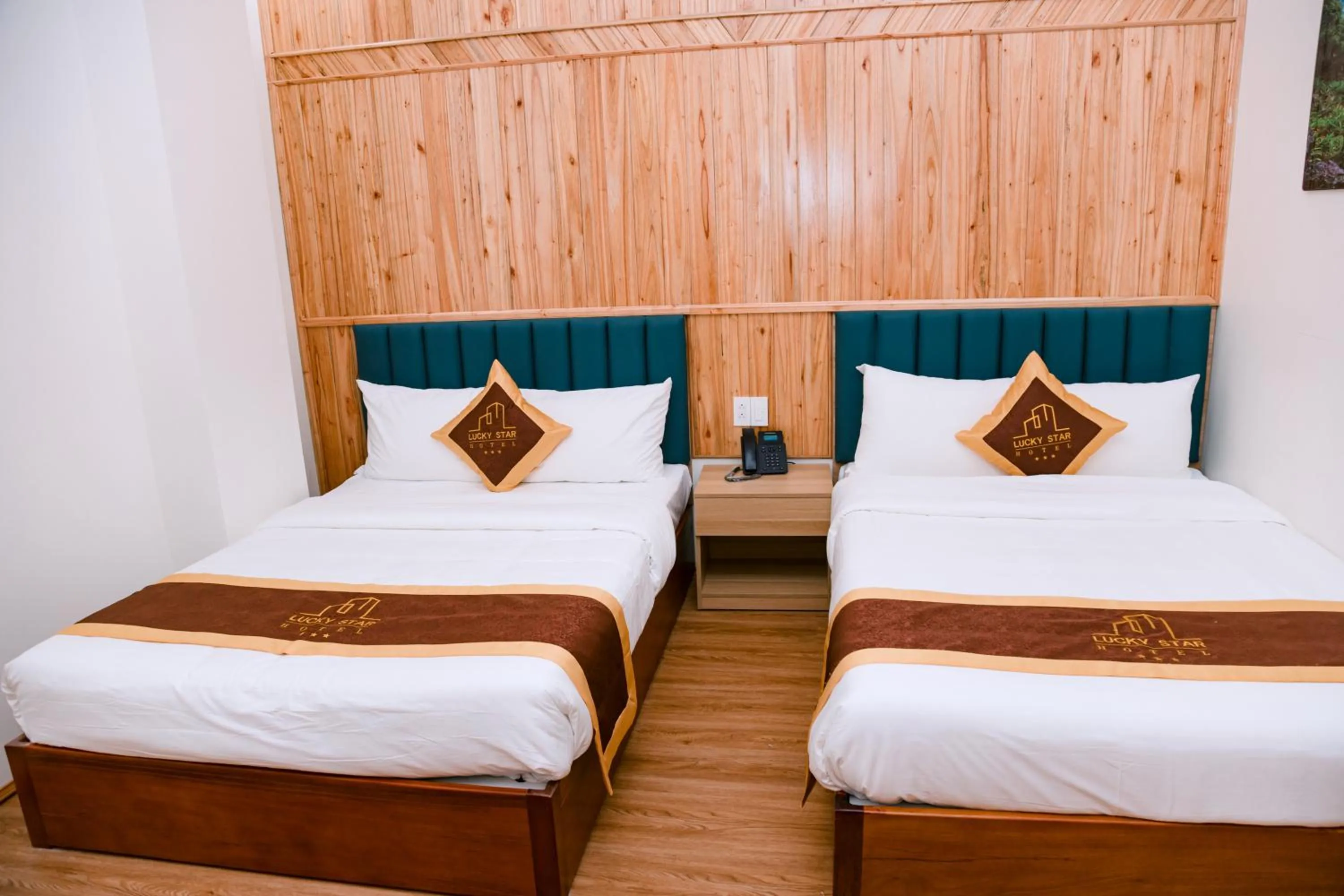 Bed in LuckyStar Hotel