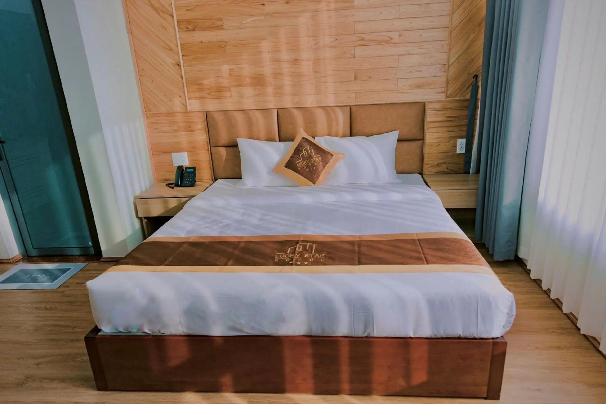 Bed in LuckyStar Hotel