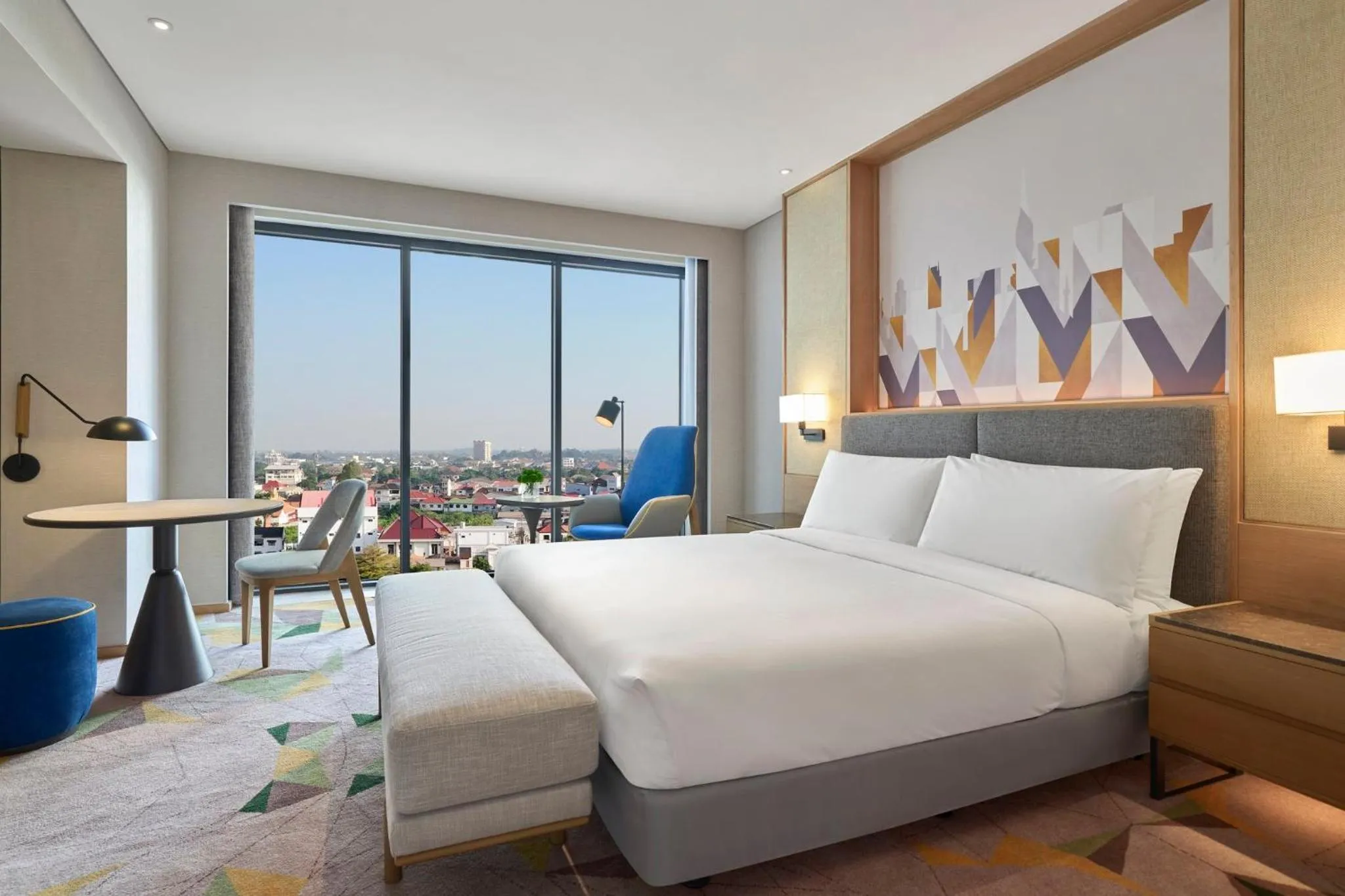 Photo of the whole room, Bed in Holiday Inn & Suites Vientiane by IHG